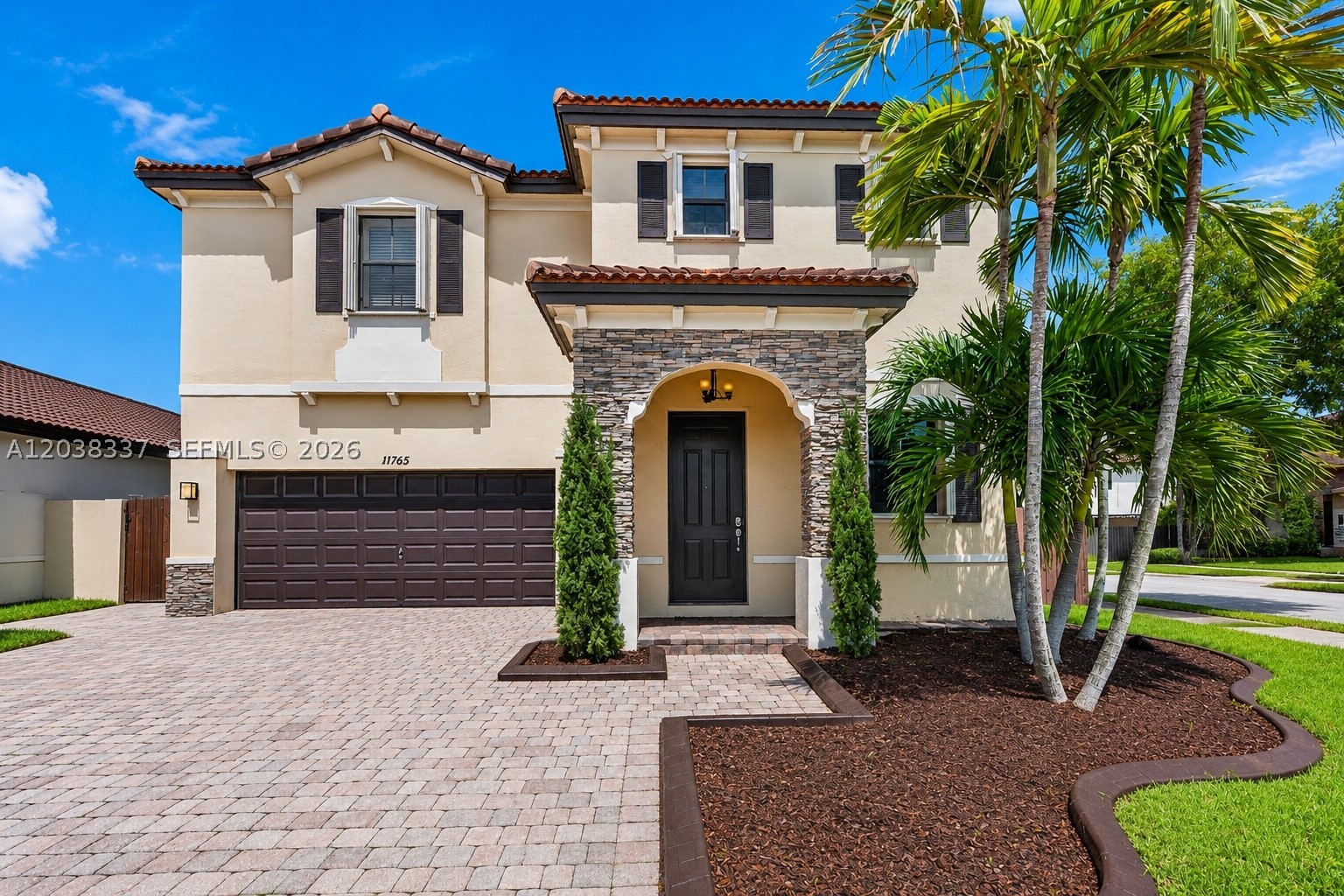 Beautifully remodeled 5-bedroom, 3-bathroom two-story home located in CENTURY GARDENS Tamiami. This move-in-ready residence offers a spacious and functional layout, including the convenience of one bedroom and a full bathroom on the first floor, perfect for guests, in-laws, or a home office. Features include an updated kitchen, modern finishes, and impeccable condition throughout. Enjoy ample parking with a double-car garage plus additional space for 2-3 vehicles in the driveway. The fully paved backyard is ideal for entertaining, featuring a large covered terrace with outdoor ceiling fans and plenty of room to relax and enjoy. Conveniently located. Ready for immediate occupancy! Schedule your visit today