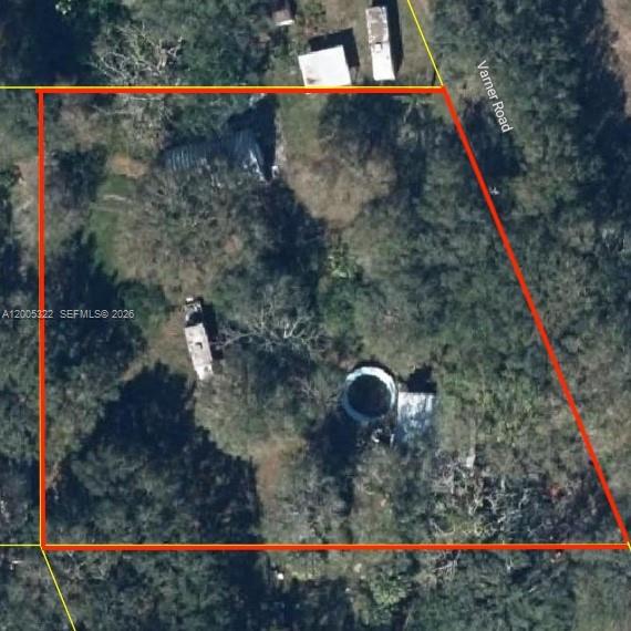 Looking for the perfect canvas to build your dream home or next development project? Look no further! Nestled in a peaceful setting, this spacious lot offers an abundance of natural beauty with a lush, wooded backdrop and ample acreage to bring your vision to life. Whether you're looking to build a private retreat or explore development possibilities, this property delivers outstanding potential. Conveniently located in close proximity to dining, shopping, schools, hospitals, and places of worship. This is a cash sale. This is a probate sale and is subject to court approval.