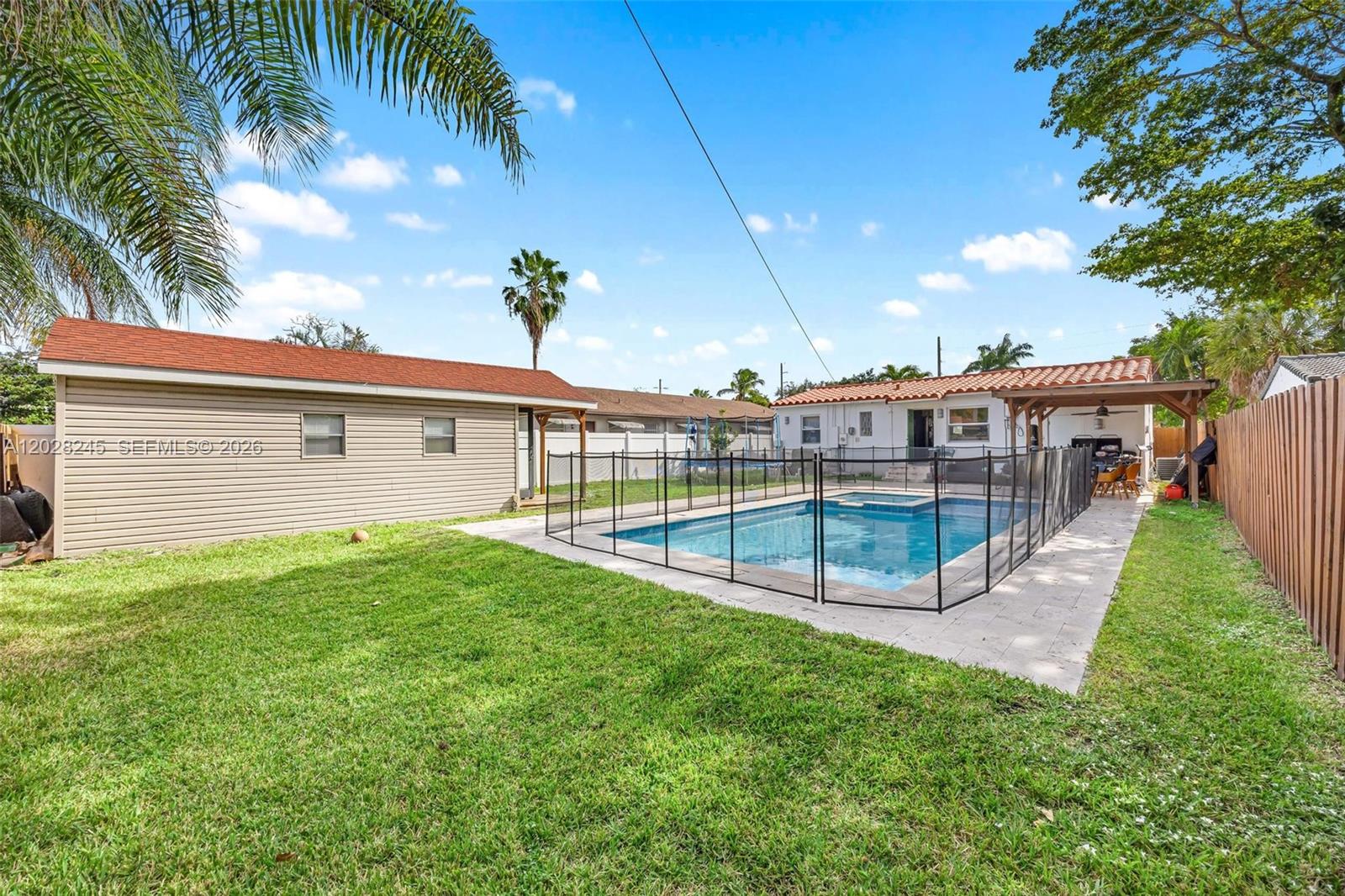 Rare Hollywood opportunity featuring a brand-new private pool, covered pergola, and a spacious approximately 400 sq ft detached guest house complete with kitchenette and bathroom. This flexible space is ideal for an in-law suite, guest quarters, private studio, home office, or potential rental-income setup, subject to local rules and approvals.
The main home is a beautifully updated furnished 3-bedroom, 2-bathroom residence with a modern kitchen, renovated bathrooms, porcelain tile flooring, and comfortable living areas. Designed for both lifestyle and versatility, the property offers a resort-style backyard perfect for relaxing, entertaining, outdoor dining, and enjoying South Florida living.
Conveniently located in Hollywood, FL, minutes from Hollywood Beach, shopping centers, dining, entertainment, and major highways, this move-in ready furnished pool home blends privacy, flexibility, and everyday convenience.
