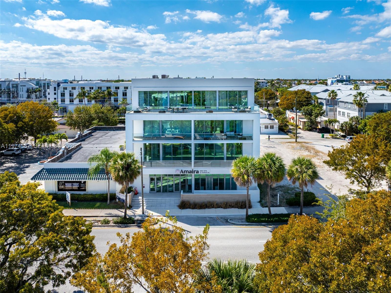 Experience refined boutique living in the heart of East Delray Beach with this exceptional residence at Aría, just steps from Atlantic Avenue and the ocean. This sophisticated 2-bedroom, 2-bath condominium plus versatile den/office offers approximately 1,543 sqft of open, light-filled living space framed by soaring ceilings, premium finishes and elegant design details. Thoughtfully planned for both everyday comfort and entertaining, the expansive living and dining areas open to a generous balcony — perfect for indoor-outdoor living and al fresco gatherings. The kitchen features contemporary cabinetry and an intuitive layout that flows effortlessly throughout the home. The serene primary suite provides a private retreat with abundant natural light and designer touches, while a second bedroom and flexible den/office space adapt to your lifestyle needs. Residents enjoy  a premier downtown address moments from world-class dining, shopping, nightlife and pristine beaches. Aría delivers an unparalleled blend of urban sophistication and coastal ease in one of South Florida’s most desirable walk-to-everything neighborhoods
