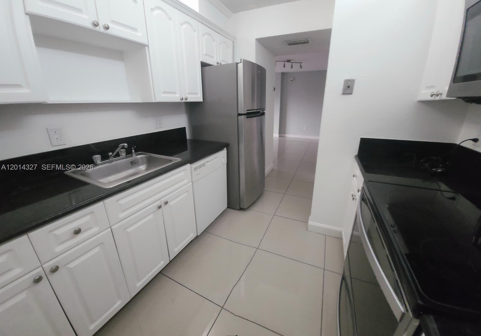 SAGA BAY GARDENS CONDO - Residential