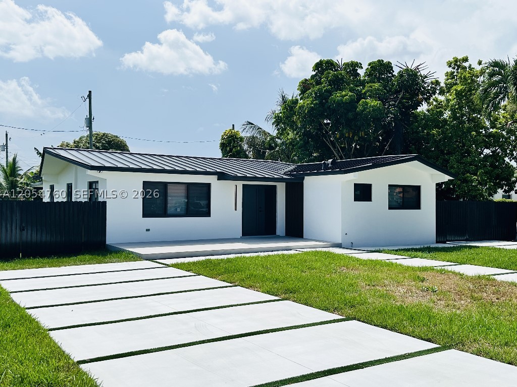 Fully remodeled and spacious 3 Bedroom 2 Bathroom Home! House features an oversized lot, new tankless Water Heater, new A/C Unit, new Stainless Steel Appliances, new Washer and Dryer, LEDs recessed lights throughout the house, new Impact Windows and Doors, & Much More! This home has a large family room, a beautiful modern kitchen with calacatta quartz countertop, a modern driveway and a backyard with a large aluminum terrace, great for entertainment.