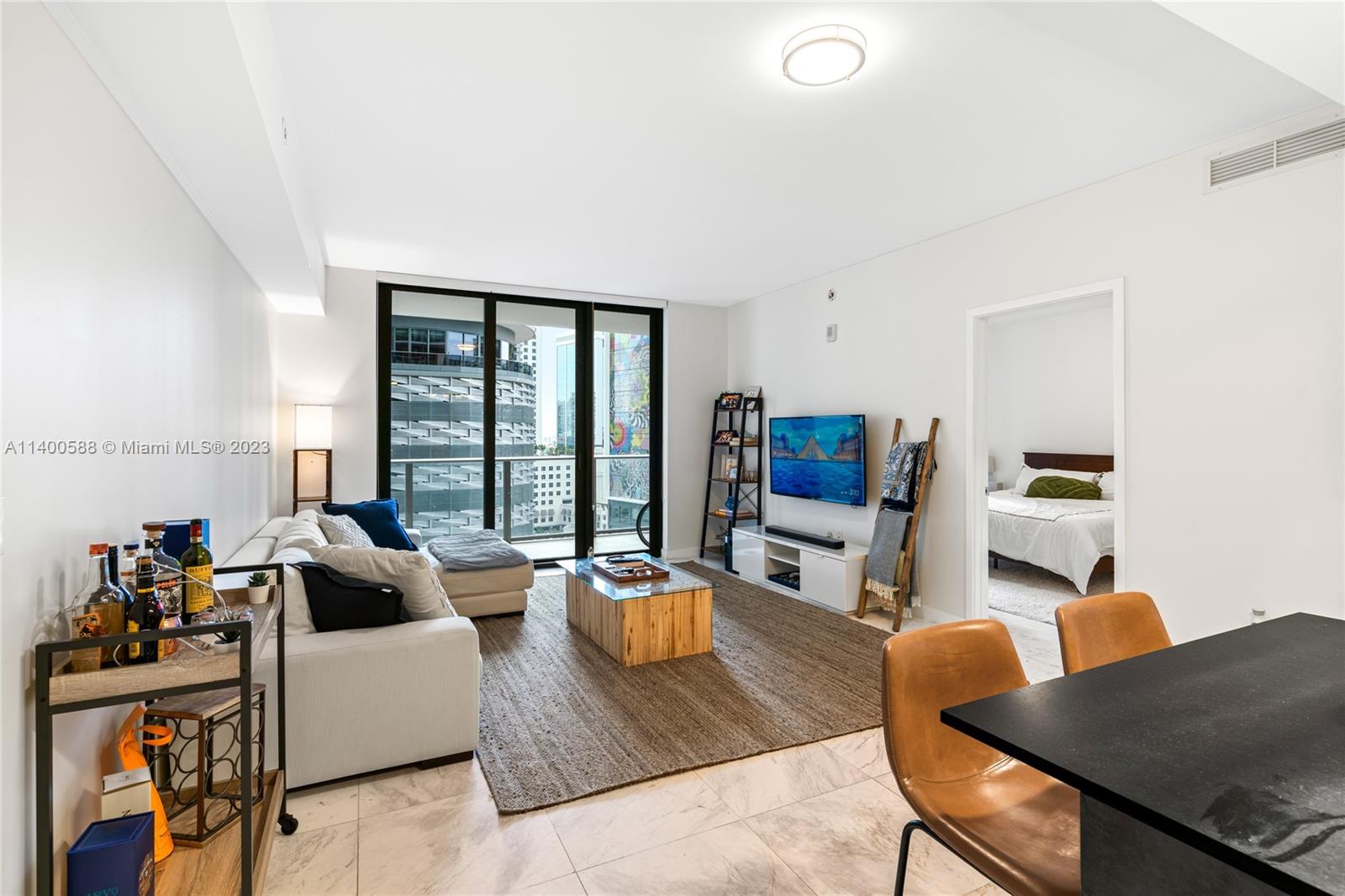 Welcome to the spectacular 2-bedroom, 2-bath apartment located in the renowned 1010 Brickell condominium. This luxurious unit boasts an array of upgrades, including window treatments with both blackout and roller shades, sleek porcelain floors, a stylish kitchen and a generously sized terrace. 1010 Brickell is well-known for its fabulous amenities, which include a rooftop lounge, a pool perfectly positioned to watch the sunrise and sunset, an outdoor theater, and a fire pit. Additionally, the club level at 1010 Brickell features a bocce ball court, a squash court, a full-service spa with a co-ed hammam, indoor and outdoor play areas for the kids, a virtual golf simulator, a social room, and much more.