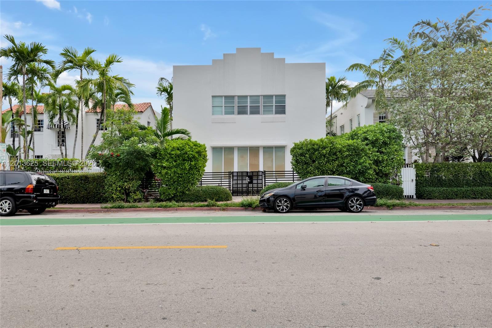Bright corner residence with soaring 11+ ft ceilings in an exclusive 2005 South Beach condo conversion designed by award-winning architect Chad Oppenheim. This architecturally significant home blends historic character with modern design within a boutique building in one of South Beach’s most coveted enclaves. Ideally located just moments from the beach, Lincoln Road, Flamingo Park, and world-class dining. Oversized windows fill the space with natural light, highlighting bespoke hardwood-effect flooring and an airy open layout. The kitchen features granite countertops, GE Profile stainless steel appliances, and sleek recessed lighting. A spa-like marble bathroom and in-unit washer/dryer add everyday comfort and convenience. An exceptional opportunity to enjoy sophisticated South Beach living in a distinctive architectural setting.