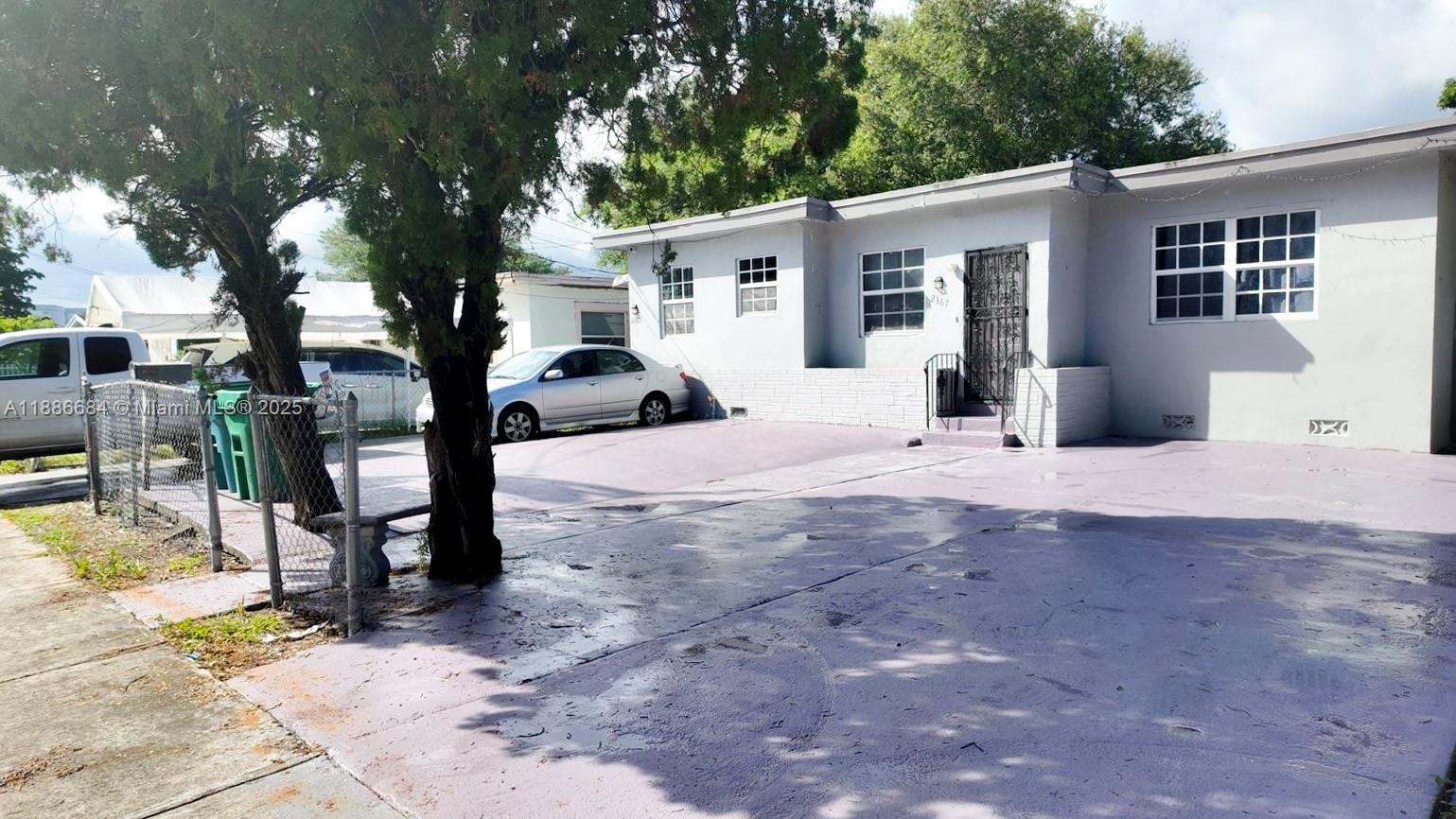 Duplex with 3 total units, currently leased month to month. Income-producing property with upside potential through light upgrades. Located in the 33147 area, close to West Little River/Gladeview. Please do not disturb tenants. Showing instructions upon request.