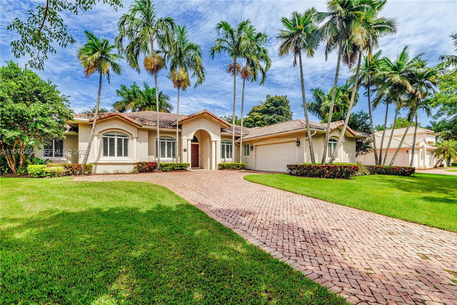 Beautifully updated 4BD/3BA + office residence in the gated Flamingo Gardens community in Palmetto Bay. This open split floor plan home features volume ceilings, impact glass, marble floors, and spacious formal and casual living areas. The renovated kitchen offers an eat-in layout, pantry, and premium Sub-Zero and Garland appliances. French doors lead to a resort-style backyard with pool, expansive covered patio ideal for entertaining, and lush fenced landscaping. The primary suite features a dual-entry walk-in closet and a spa-style bath with dual sinks, separate tub and shower. Additional highlights include whole-house audio with speakers throughout, 3 A/C units, alarm system, epoxy-finished 2-car garage, gated side yard with room for boat storage, and lush 15,180 SF lot. Located in a coveted 44-home community close to top schools, parks, and major destinations, offering the perfect balance of privacy and convenience.