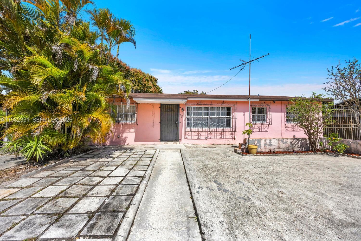 Unlock the potential of this Miami Gardens home filled with opportunity. Originally a 4-bedroom, 2-bathroom layout, the home was thoughtfully converted to a spacious 3/2 to create a larger, open, and bright living area, with the option to easily convert it back if desired. This home is ready for your personal touch and offers great potential. The roof was replaced in 2017 and the home has been freshly painted. The backyard is a true highlight, featuring a variety of tropical fruit trees and plenty of space for expansion, entertaining, or creating your own outdoor oasis. Great opportunity to make it your own. Home is being sold as-is.