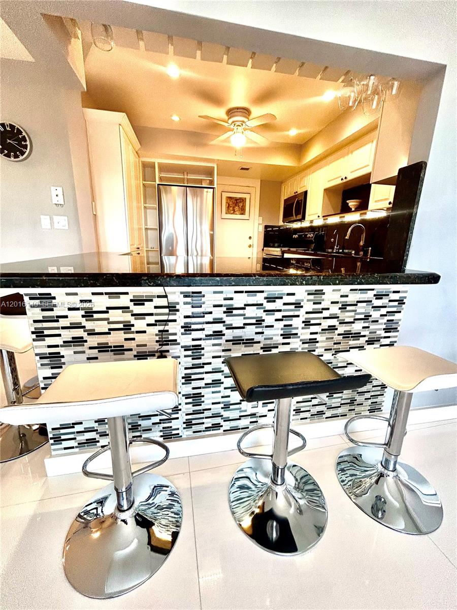 Live the Dream with Stunning Intracoastal & Golf Course Views! COME SEE IT ASAP! Included Fully designer furniture* updated 2-bedroom, 2-bath condo breathtaking views in a well-maintained building. This spacious residence features elegant white porcelain glass flooring, designer kitchen with new appliances, and tastefully renovated bathrooms. large walk-in closets plus additional storage. Covered 1 parking & guess .The maintenance cover water, cable &internet. Enjoy resort-style gym, two heated pools, and a game room. Perfectly located just minutes from the beaches, top dining, shopping & nightlife, easy access to major highways—this condo offers the ideal combination of luxury, convenience, and lifestyle. Experience luxury & make this dream home yours today! Call ASAP EASY TO SHOW!!