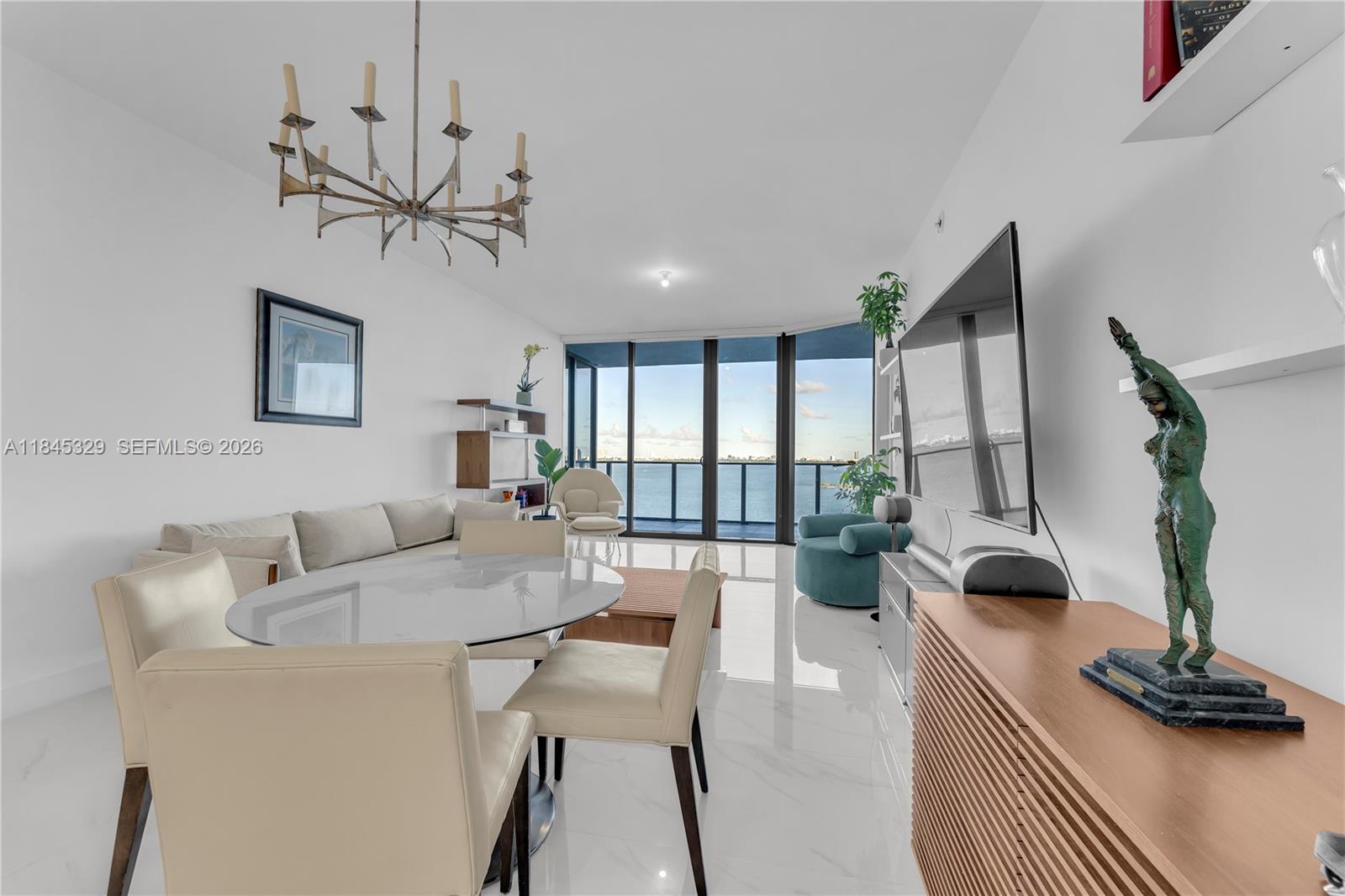 Experience elevated coastal living in this 3-bedroom + den sky residence at Miami’s newest luxury landmark. Enjoy a private foyer, expansive layout, and floor-to-ceiling glass showcasing unobstructed bay and skyline views. Designed for those who crave space, style, and serenity with world-class amenities and waterfront elegance. All in the heart of it all, just minutes from the Design District, Midtown, Downtown, the beach, and everything Miami has to offer!