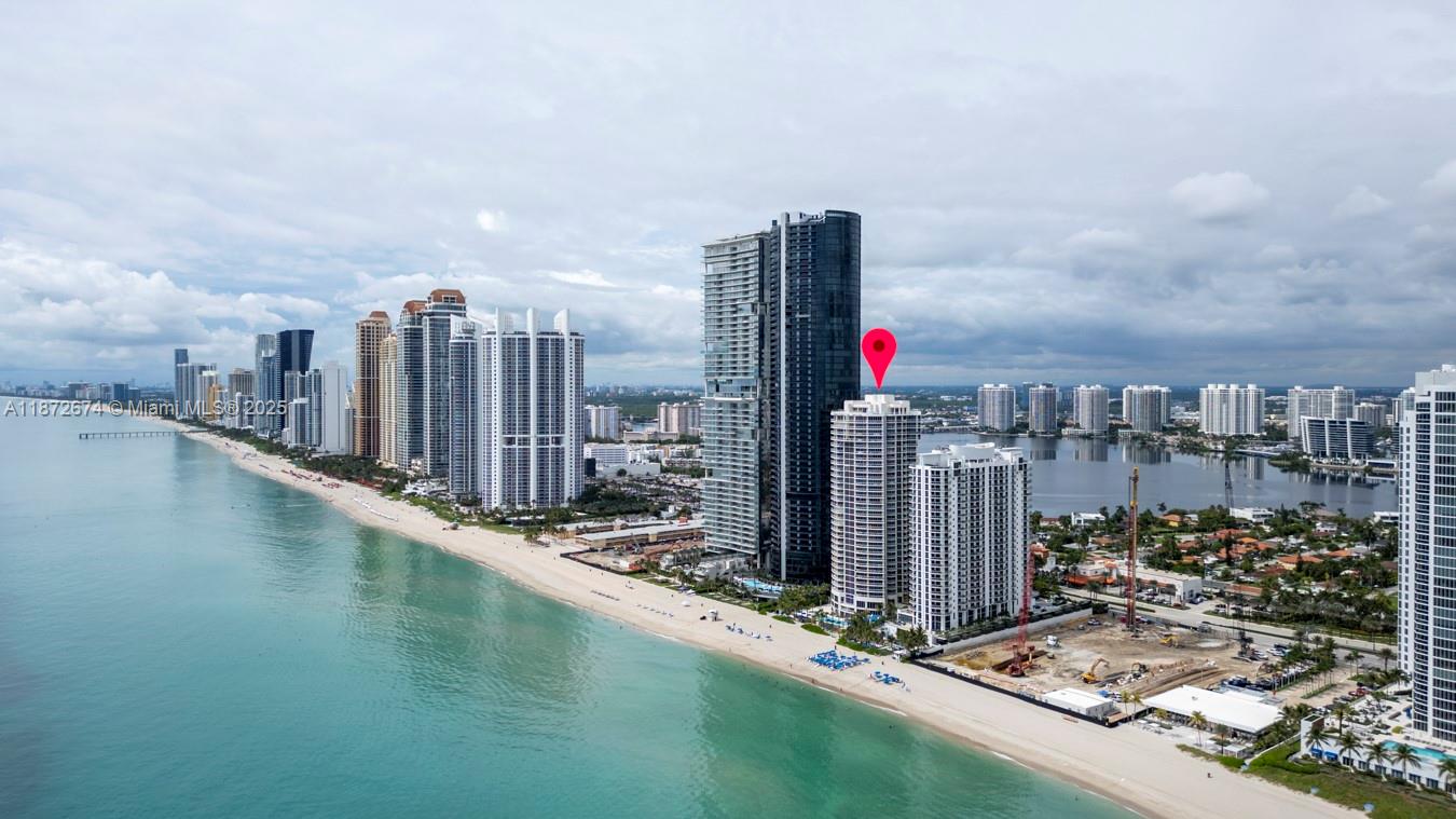 2-bedroom plus Den and 2.5-bath condo at Millennium Tower in Sunny Isles Beach. This spacious residence offers ocean and city views from every room, and floor-to-ceiling windows that fill the space with natural light. Millennium is a full-service boutique building with 24-hour concierge and valet, private beach access, pool, fitness center, tennis courts, and more. Located in the heart of Sunny Isles Beach, just minutes from Bal Harbour Shops, Aventura Mall, fine dining, and top-rated schools.