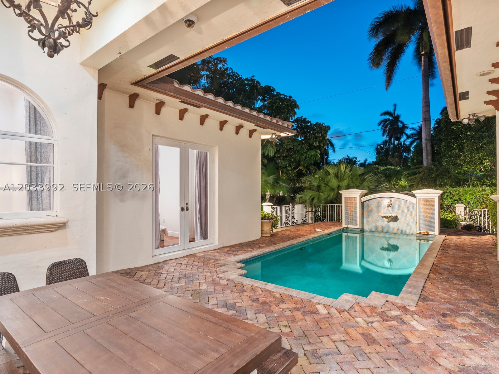 Privileged location with breathtaking views of South Lake and the Intracoastal Waterway! Nestled in the heart of prestigious Hollywood Lakes, this stunning Mediterranean-style residence blends timeless elegance with exceptional comfort.

Featuring 5 spacious bedrooms and 3 beautifully appointed bathrooms, this home welcomes you with a grand foyer, soaring ceilings, and elegant architectural details throughout. Brazilian cherry wood flooring enhances the warmth and sophistication of the bedroom spaces, while expansive living areas create the perfect setting for both everyday living and entertaining.

The gourmet kitchen is thoughtfully designed with custom wood cabinetry, granite countertops, and premium stainless steel appliances — ideal for cooking and gathering with family and friends.

Step outside to your private backyard oasis featuring a heated pool with waterfall, beautifully paved patio, and serene South Lake views that create the ultimate South Florida lifestyle. Ideally located just moments from the beach, fine dining, shopping, and vibrant downtown Hollywood, this exceptional home offers luxury living in one of Hollywood’s most sought-after neighborhoods.