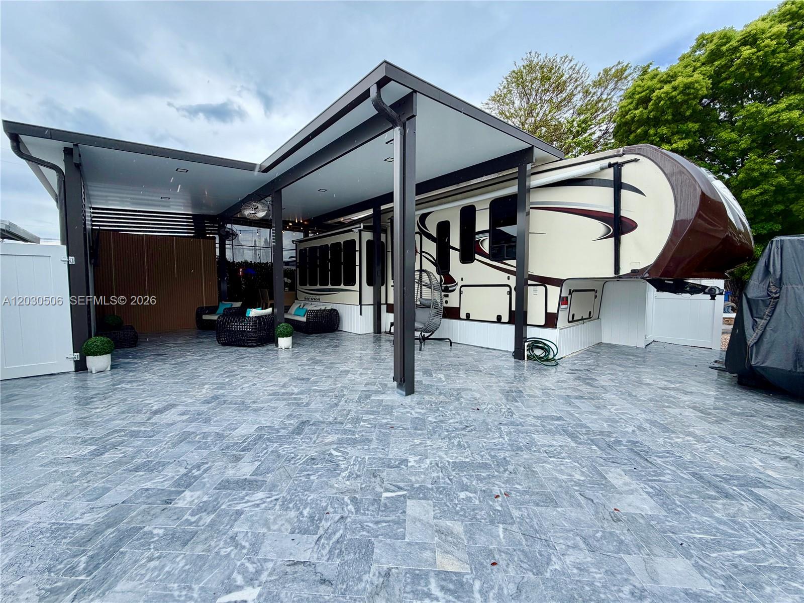 SELLER FINANCING AVAILABLE!! Beautiful lot located in the highly desirable Calusa Campground Resort in the Florida Keys. This RV features a spacious unit with a large master bedroom, oversized closet, full bathroom, and an open-concept living area. The comfortable living room includes a sleeper sofa, providing additional accommodations for family and guests. The true highlight of this property is the exceptional outdoor entertainment space. Enjoy a beautifully upgraded gazebo with a paved driveway, custom outdoor bar, two outdoor refrigerators, large TV entertainment area, outdoor shower, and a converted storage shed that serves as an outdoor kitchen, creating the perfect setting for relaxing and entertaining in paradise. Whether you're looking for a personal getaway, seasonal retreat, or income-producing investment, this property offers outstanding flexibility. Calusa is one of the few communities in the Florida Keys with no rental restrictions, making it an excellent opportunity for short-term vacation rentals and year-round income potential. Enjoy the community boat ramp and easy water access, allowing you to launch your boat and enjoy world-class fishing, boating, and waterfront recreation just minutes away.
Located only one hour from Miami, Calusa offers resort-style amenities including a marina, boat ramp, temporary dockage, 24-hour security, swimming pool, tennis and basketball courts, playground, on-site laundry facilities, and a community recreation hall.
