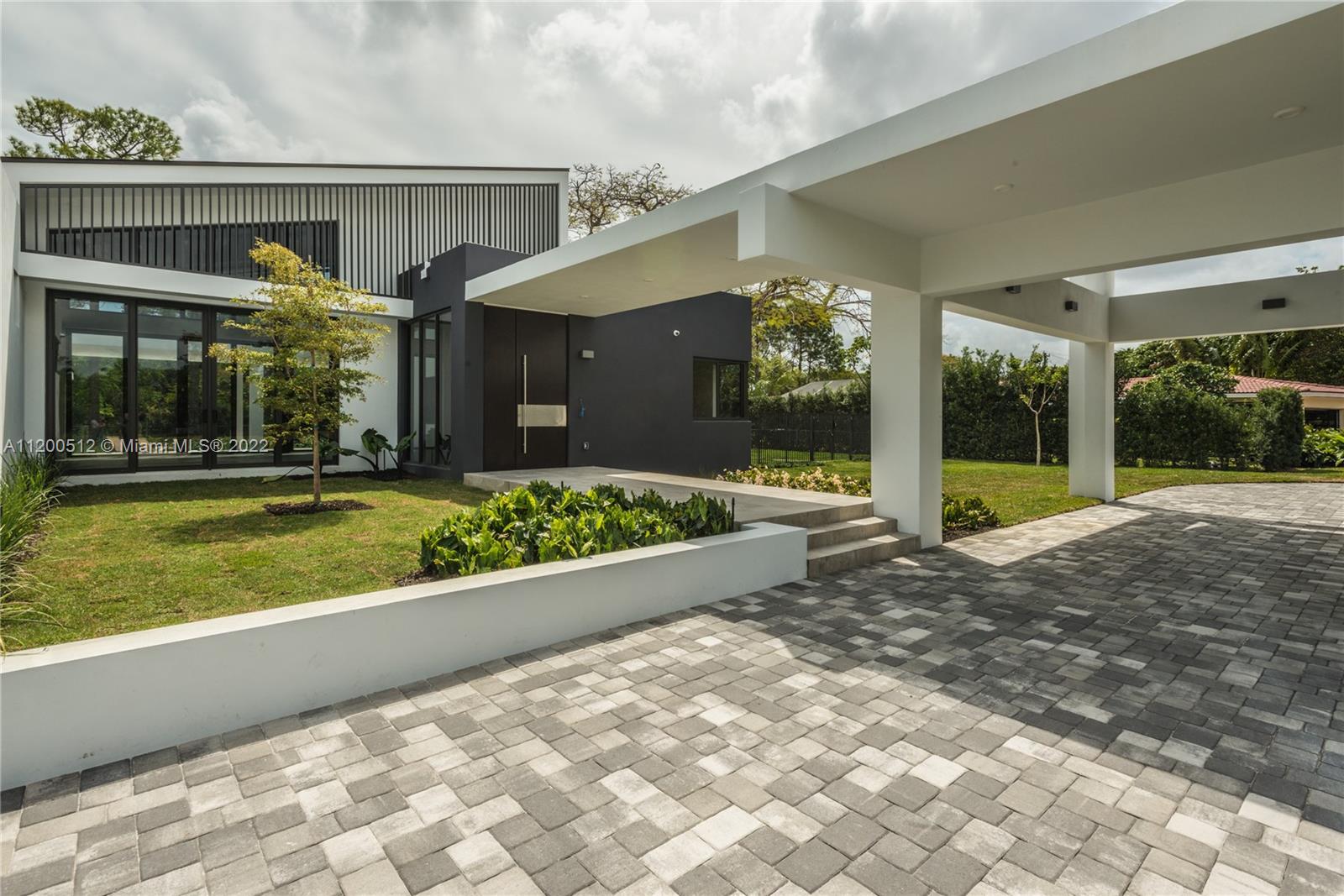 Welcome to a contemporary amazing design home, located in the Sunset View neighborhood. One-story design consisting of 5 bed and 5 bath. Each room has a private bath with modern fittings glass enclosures. The 18’ x 28’ great room has a sloped ceiling,  Perfect for entertaining, opens onto a large covered patio and pool area. Adjacent to the great room is the kitchen/family room area, which carries along the design of the ceiling, reaching a height of almost 18’. This great property, is equipped with the best water purification system and a generator. Included in the rent is pool and garden maintenance. SHOWINGS THRUSDAY FROM 9-11 AM UNTIL END OF LEASE AT JULY 30TH. Maintenance contract of generator and purification system is responsibility of tenant.