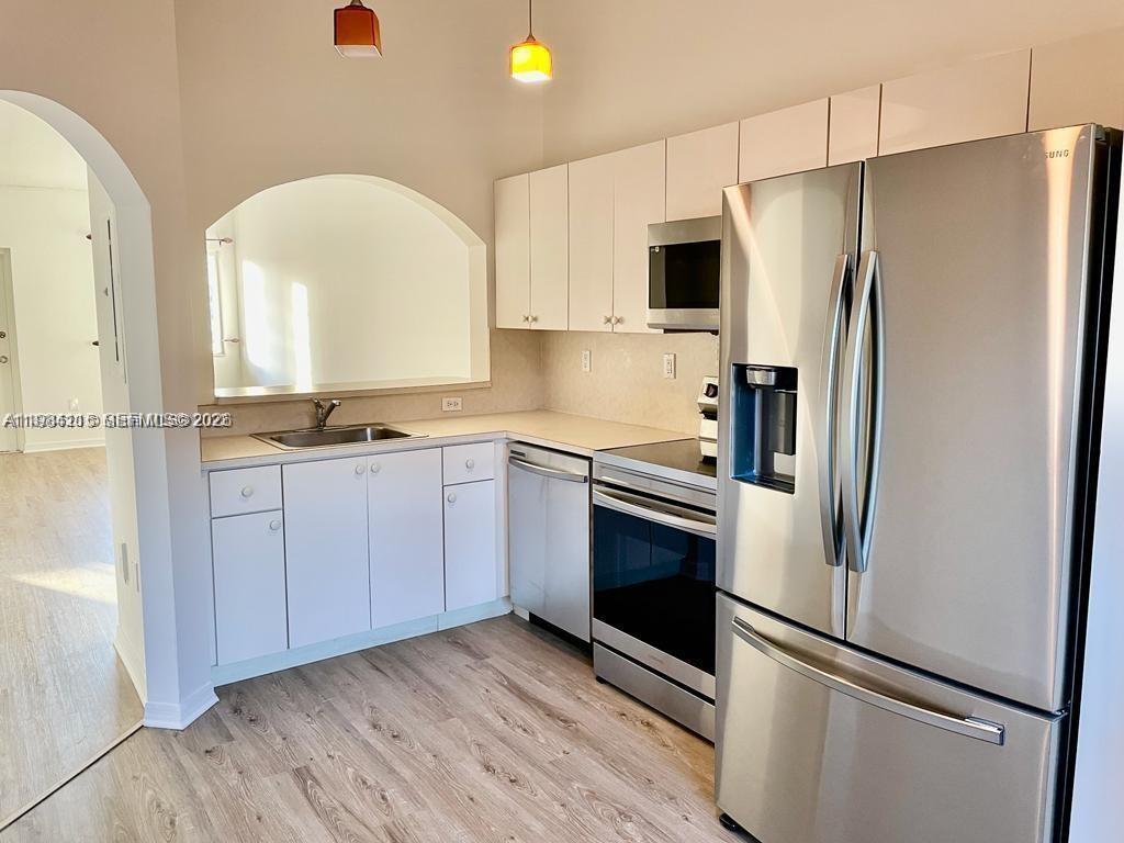 Investor opportunity — tenant occupied with lease in place through December 2026, providing immediate rental income. Located in one of Homestead’s most desirable communities, Malibu Bay, this beautifully updated second-floor residence in Monterrey features 2 bedrooms and 2 bathrooms with a bright, open-concept layout. The unit showcases brand-new vinyl flooring throughout, a modern kitchen equipped with Samsung stainless steel appliances, and a new A/C system. Enjoy the convenience of an in-unit washer and dryer, one assigned parking space, and plenty of guest parking. Residents have access to resort-style amenities including a clubhouse, fitness center, and pool. Ideally situated just minutes from the Florida Turnpike, Homestead Hospital, shopping, dining, and Black Point Marina.