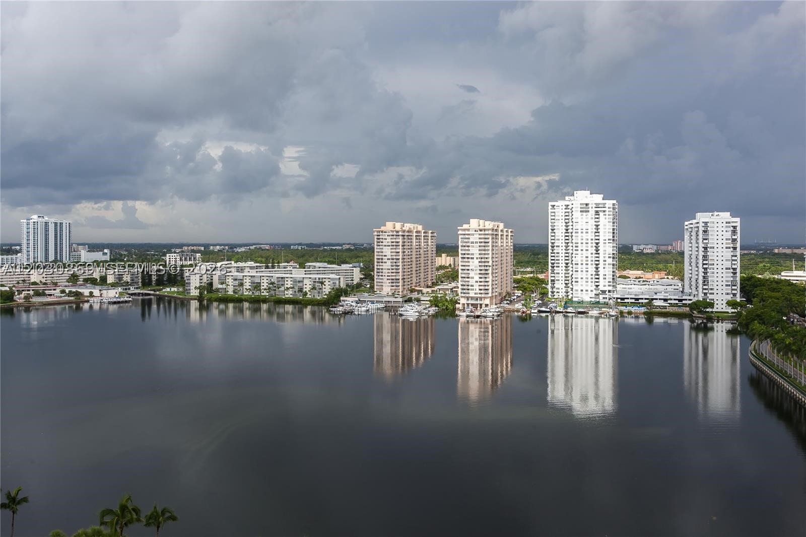 Beautiful water views and an unbeatable Aventura location! This remodeled 2-bedroom, 2-bathroom waterfront condo offers the perfect combination of lifestyle, convenience, and value. Ideally situated just minutes from Sunny Isles Beach, Aventura Mall, houses of worship, top-rated schools, shopping, dining, and entertainment. Enjoy breathtaking water views from nearly every room. The spacious primary suite features abundant closet space, a floor-to-ceiling window, and stunning water views that can be enjoyed right from bed. The generously sized second bedroom offers a double closet and plenty of space for a home office, study area, or guest accommodations. The bright and open living and dining areas are surrounded by floor-to-ceiling windows, filling the residence with natural light while showcasing beautiful water views throughout. Recent upgrades include brand-new flooring and new appliances, new electric panel, making this home truly move-in ready. Located next to prestigious Williams Island and within walking distance to Fresh Market, Starbucks, restaurants, and everyday conveniences. Residents enjoy the highly desirable City of Aventura lifestyle, known for its excellent schools, parks, recreation, and proximity to world-class beaches. A rare opportunity to own a beautifully renovated waterfront condo in one of Aventura's most sought-after locations.