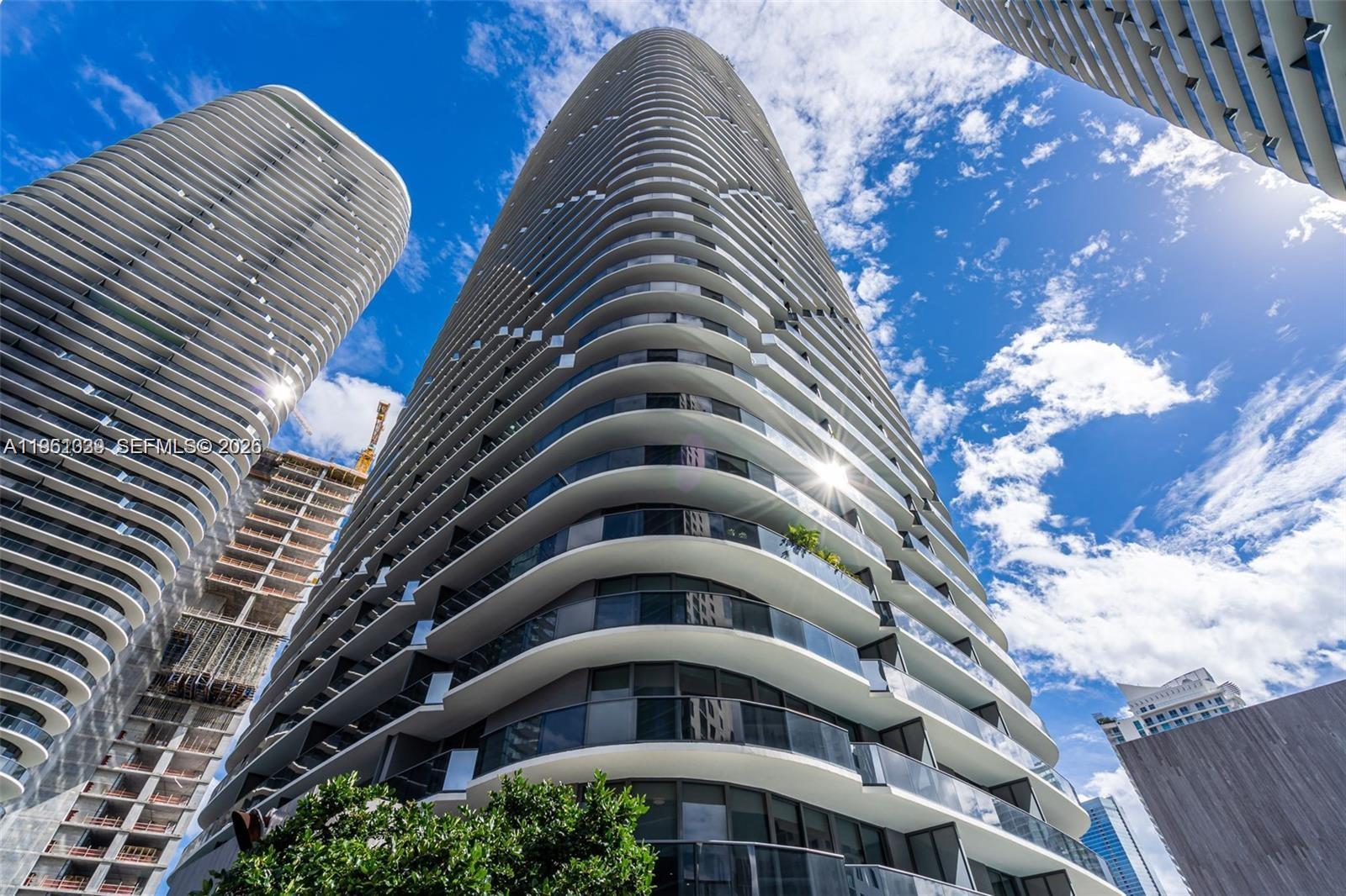 desirable 04-line residence, 1 bedroom plus den, 2 full baths, an open-concept layout, and a spacious balcony with stunning city and bay views. The den is perfect for a home office or guest space. Enjoy resort-style amenities including two pools, Equinox Fitness Club, spa, business center, theater, massage room, and children’s playroom. Ideally located just steps from Brickell City Centre, Mary Brickell Village, and premier dining and entertainment. Association fee is $607.13 plus a master HOA fee of $683.21.