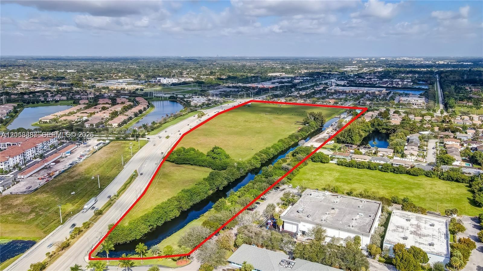 Location is Everything & this spot is situated in the middle of it all; Davie, Cooper City, Pembroke Pines & Hollywood FLA. There's 1,800' of frontage on University Drive, another 600' of frontage on Stirling. A traffic count of 82,000 per day, WOW What a corner! We're in the Town of Davie, their B-3 Zoning allows; Banking, Bowling, convenience Stores, Hotels/Motels, Medical, Movie/Performing Arts, Retail, Restaurants, Fast Food. AND we're down the street from everything: Nova Southeastern College, Hard Rock Casino, Guitar Hotel, FLL & North Perry Airport, Expressway, Turnpike & the BEACHES. EZ Access to Everything. We have 1,239,176SF of possibility, 28.44AC, Less easements/set backs we have a possible 21AC Usable. Let's talk & get you the CAD Survey to design your next BUILD