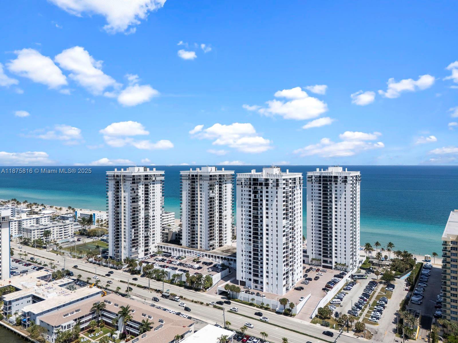 Freshly cleaned Stunning 2/2 ocean front condo with ocean views in the Catania building at The Quadomain. This property features Impact windows and doors, laminate wood floors throughout the common areas and bedrooms, marble in the bathrooms. Updated kitchen cabinets with granite tops and stainless-steel appliances. Close to fine dining, shopping and highways. Property features 2 pools, Gym and Billiard room with Valet parking.SELLERS WANT OFFERS !!!