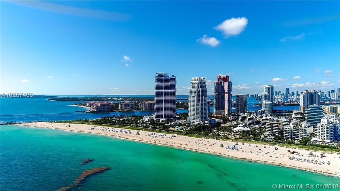 Spacious corner residence completed w highest quality craftsmanship. Located on the most unique floor offering an oversized terrace, enjoying sweeping views of the coastline, South Beach, bay & downtown Miami. Split bedroom plan each with a private balcony. Projection TV in Living and Master bedroom,Gourmet kitchen w Subzero, Miele Appliances.  Two wine coolers, oversized washer/dryer. Private Foyer entry, 10 FT ceilings with floor to ceiling glass. Continuum 5-star amenities include 24-hour security/valet, 3 tennis courts, private beach pavilion, 2 lagoon style pool, 23,000 SQFT sporting club & spa w Lap Pool.