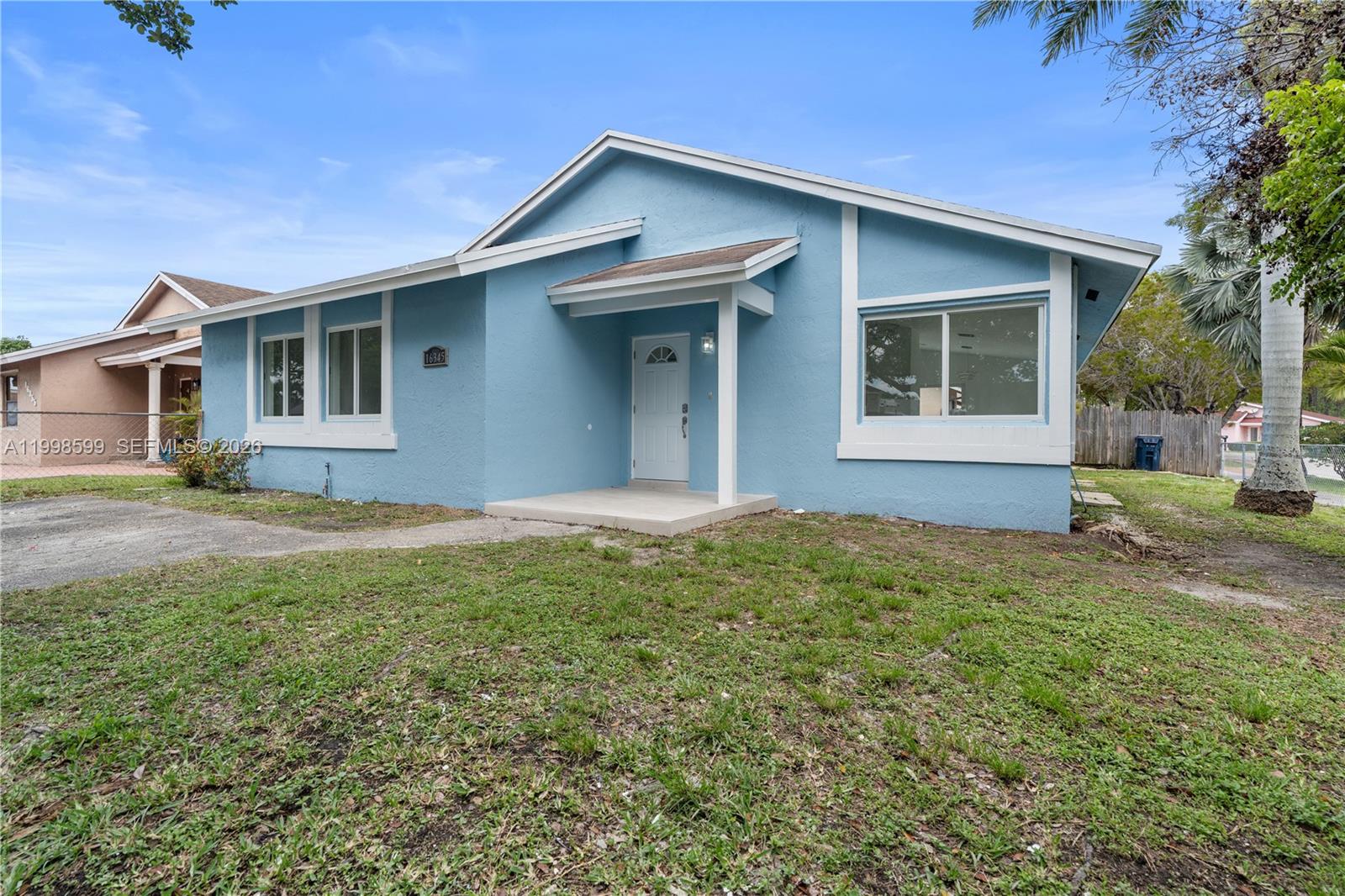 A comfortable and spacious property featuring an exquisite interior architectural design. The home offers ample parking and generous green space, ideal for outdoor gatherings and family activities. The property includes impact windows for added security. Seller is offering closing cost incentives with preferred lender.