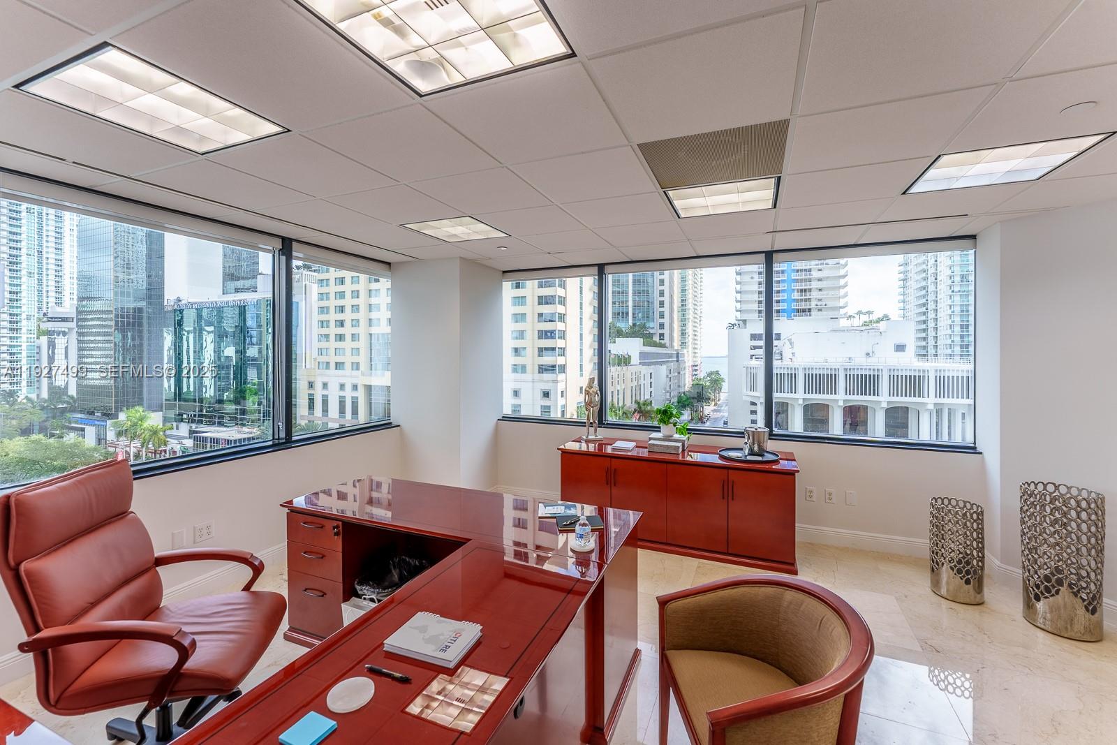 Impressive 2,677 SF professional office at 1200 Brickell, combining suites 850 A–E into one elegant, functional space. Thoughtfully designed layout with reception area, multiple private offices, two conference rooms, open work areas and a full kitchen—perfect for a modern, collaborative team. Large windows flood the space with natural light and offer beautiful city skyline and bay views. Located in the heart of Brickell’s financial district, just minutes from I-95, Metro, dining and shops. Ideal for a law firm, financial services, tech or any business seeking a prestigious Brickell address and a true turnkey office.