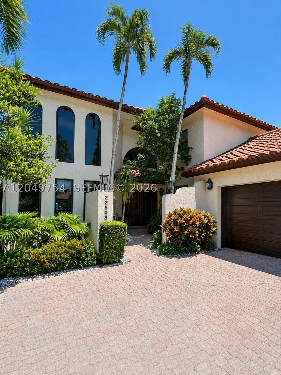 SCHEDULED TOURS: MONDAY (7/13) 3 PM - 6 PM / WED (7/15) 10 AM - 1 PM. CONTRACT LISTING AGENT TO HAVE YOUR NAME ADDED TO THE GATE. ALL OFFERS MUST BE RECEIVED BY 7/16. This property is correctly priced with the right buyer in mind who is ready to invest in creating the home of their dreams. Design and reimagine; you have a blank canvas and remarkable space to work with. This might be the best home purchase opportunity in all of Boca Raton! Welcome to the Boca Pointe community, which spans 1,000 acres and features lakes, mature landscaping, and a championship golf course. The main entrance is gated with 24-hour security. This is one of the largest master-planned communities in Boca Raton—a small city within itself, comprising 29 distinct villages and over 3,500 homes. It is highly sought after for its rare, NON-MANDATORY country club membership, providing resort-style living without equity buy-ins or initiation fees. Other amazing amenities: 16 Har-Tru tennis courts, pickleball courts, and Padel courts, and a modern 28,000-square-foot Sports & Fitness Center offering group classes, personal training, and aquatics, and an expansive 80,000-square-foot clubhouse hosting three distinct restaurants, a covered outdoor bar, and a grand ballroom. The home is positioned with golf course and lake views within the Esplanada sub-community. Boasting over 4000 sqft with 4 beds / 4 full baths, 2 living areas, a 2-car garage, and a comfortable outdoor entertaining space with a pool.