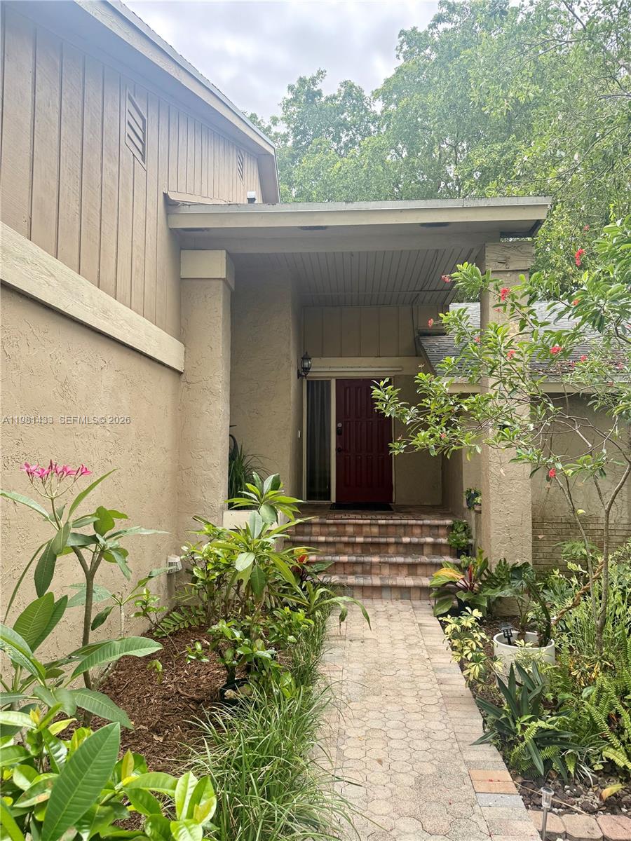 Beautifully maintained 3/2.5 home in the sought after Lakes of the Meadows community! Features a desirable split floor plan with the primary suite on the first floor w/ easy maintenance all tile flooring. Upstairs boasts engineered hardwood floors, 2 generously sized bedrooms and a loft den w/impact windows, can convert to 4th room or use as an office or guest space. Home is enhanced by an 8 y/o roof and AC for peace of mind. Step outside to a tropical oasis backyard w/lush landscaping, cozy nook ideal for relaxing or entertaining; plenty of room for a pool. Resort style amenities include clubhouse, pools, gym, sauna, basketball, racquetball, baseball, tennis, and more for a low HOA Must See. Owner/Agent Occupied. SELLER MOTIVATED offering $10k toward buyer's closing costs.