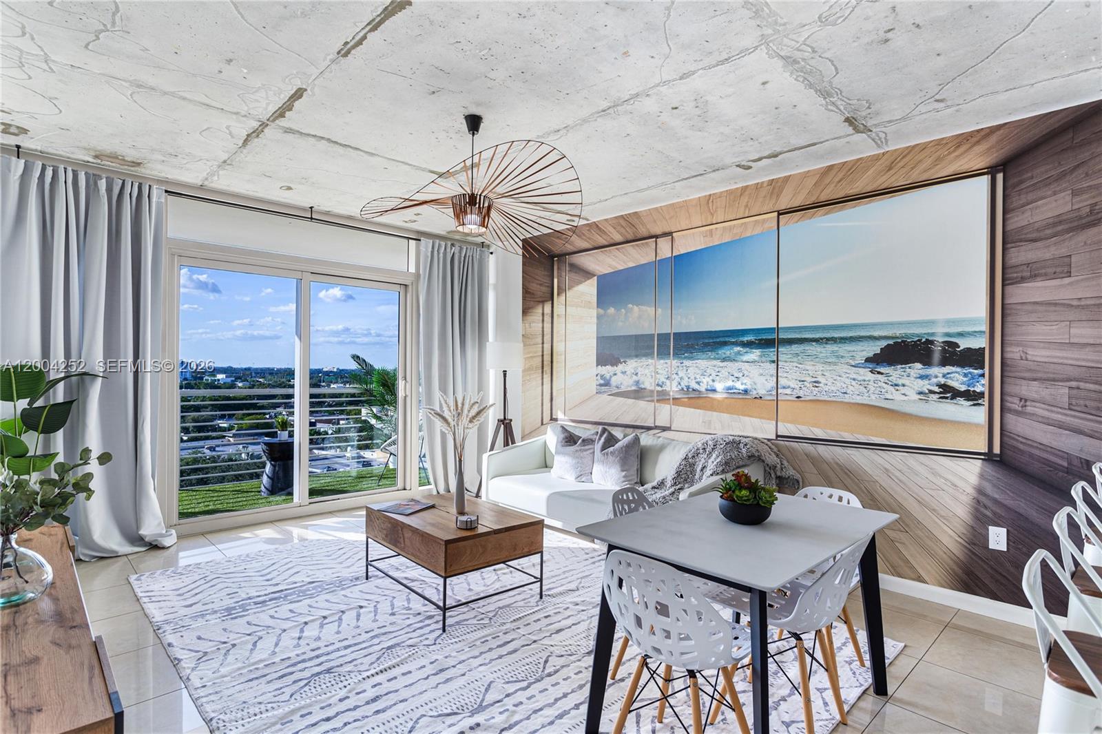 Unbeatable Midtown Location! Discover this exceptional industrial loft-style residence at Midblock, perfectly situated in the vibrant heart of Midtown Miami. This rare sophisticated minimalist design, featuring 2 bedrooms and 2 bathrooms, an open-concept kitchen with sleek stone countertops, generously sized walk-in closets, and a private balcony offering breathtaking city views. The flexibility for DAILY RENTALS presents a significant income generating opportunity. Residents enjoy access to resort-style amenities, including a pool, rejuvenating spa, BBQ area, and putting green. Ideally located, you're just moments from the renowned Midtown, Design District, and Wynwood neighborhoods. Motivated seller seeking a motivated investor – this is an opportunity that you can't miss.