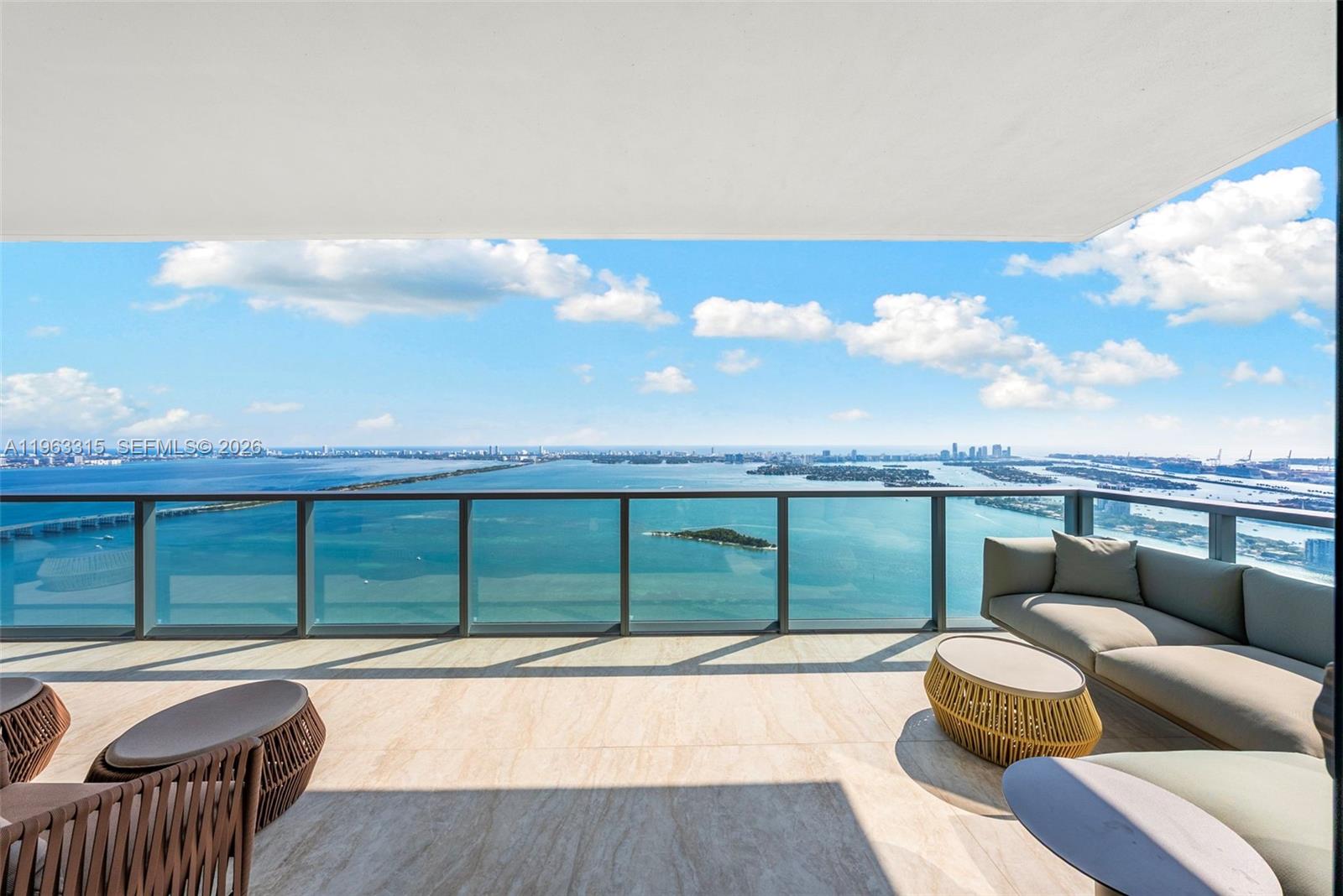 Spectacular 180-views of Downtown Miami, open bay, and ocean from this turnkey residence at Elysee Miami. Private elevator entry opens to nearly 4,000 SF of impeccably curated living space with deep terraces and unobstructed panoramic vistas through 10’ floor-to-ceiling glass. 
Italian-designed interiors featuring custom Minotti furnishings, Dekton Taj Mahal slab flooring throughout, and LED-lit gallery corridor. The property features a Lutron system, Sonos, and KEF built in speakers.
Eat-in chef’s kitchen with Miele appliances, Calacatta marble slab walls, Italkraft cabinetry, and Dekton countertops. Primary suite with laser-cut walnut wood detailing and custom Ornare dressing room with Kreon lighting. 
Family room with Ornare bar (convertible to bedroom 4) and glass-enclosed office. 
A rare opportunity for refined bayfront living.
When only the best will do at Elysee