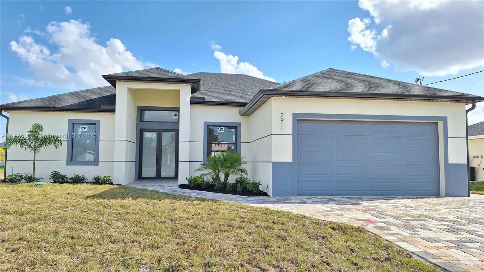 NEW LISTING!!! BRAND NEW CONSTRUCTION!!!!. This home features tile floors and quartz countertops in the kitchen and bathrooms. Two-car garage and driveway with pavers. Stainless steel kitchen appliances and modern finishes. Master Bedroom with two walk-in closets, and bathroom with dual sinks, glass shower enclosure, and separate toilet. The other two bedrooms also have a spacious walk-in closet each. Spacious Den for a comfortable office or fourth bedroom. Laundry is conveniently located inside the house and includes a laundry sink with a quartz countertop. Two-car garage and concrete driveway. Spacious lanai with a beautiful outdoor kitchen. Spacious backyard with room for a pool.