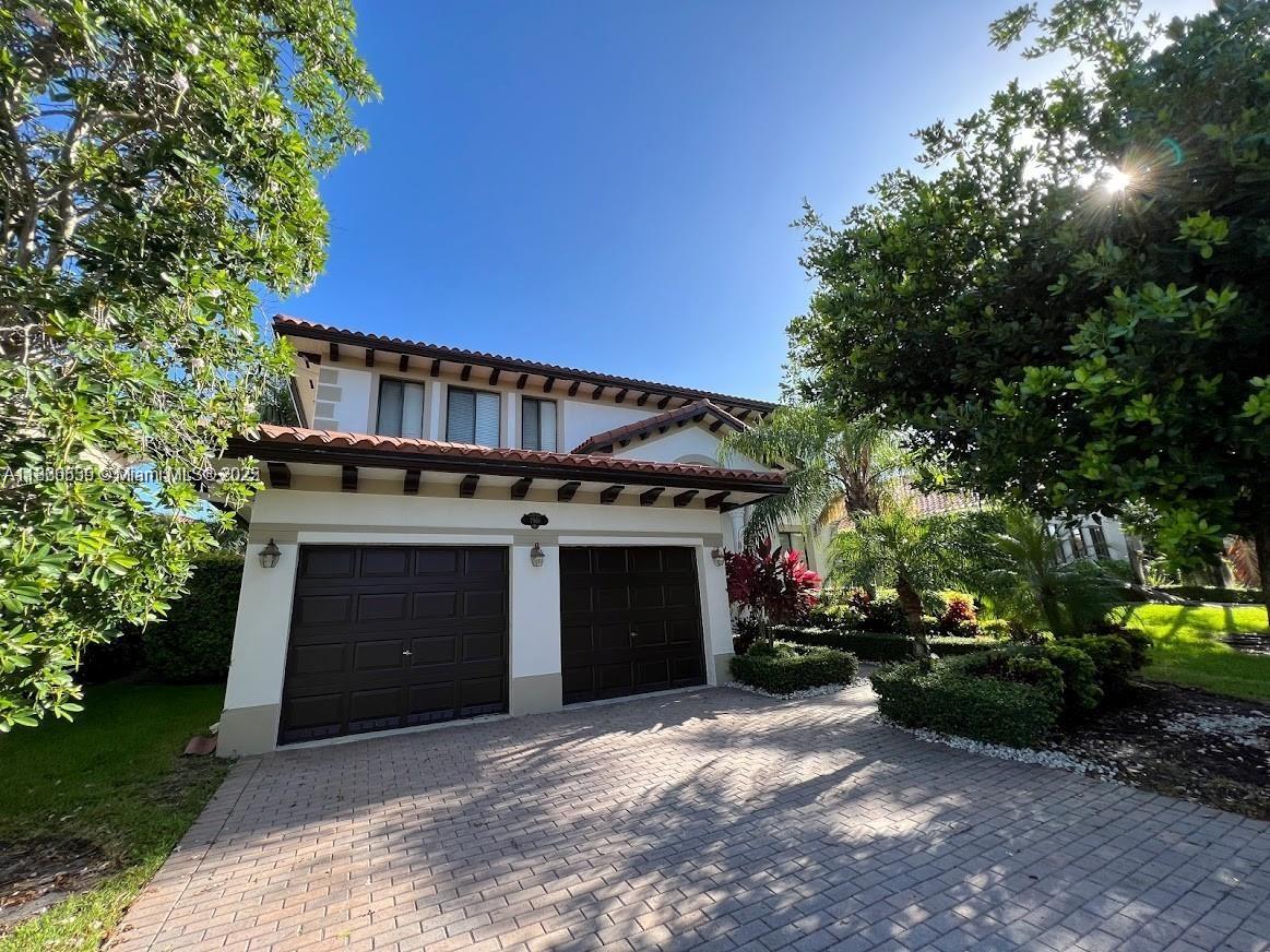 Magnificent 5BR/4BA home in the secure community of Cutler Cay. Features marble floors and European oak wood on stairs and second level, wrought iron door and staircase, and French doors. Gourmet kitchen with stainless steel appliances, wine cooler, and built-in sound and intercom systems. Property boasts a beautiful, large balcony accessible from the master bedroom. Luxurious master bath includes tub with Roman columns, separate shower, toilet, and bidet. Additional highlights include a bedroom and full bath on the first floor, laundry room, under-stair wine/storage area, two A/C units, and patio with built-in BBQ. Spacious master suite with walk-in closet. Resort-style clubhouse. Conveniently located near Black Point Marina.