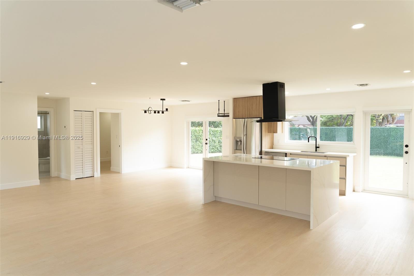 Welcome to 14868 SW 71st Ln - your move-in-ready West Kendall gem! Fully remodeled in 2024, this bright 3-bed, 2-bath home shines with a brand-new roof, impact windows & doors, gourmet kitchen w/quartz counters & stainless steel appliances, updated bathrooms, and wood laminate flooring throughout. Sitting on a huge 8,250 sq ft corner lot with plenty of room for your future pool, summer kitchen, and backyard oasis. Perfect home near A-rated schools, parks, shopping, and quick highway access. Low maintenance living with high-end finishes - just unpack and enjoy the Miami lifestyle! Don't miss this gem - come see it today!