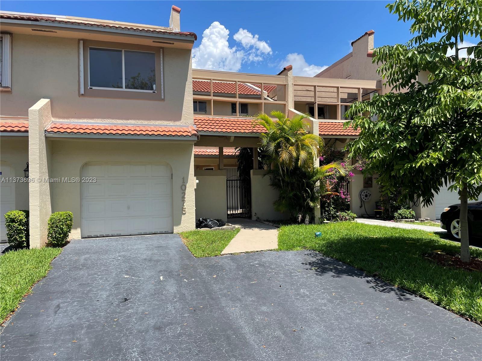 This is the place you are looking for. Remodeled townhouse in Doral Place. located in the desired community of Doral Park. Upstairs: 3 bedrooms-2 bathrooms. Downstairs: Dining, living room, half bathroom, the kitchen and 1 space garage. Second floor is waterproof vinyl plank Brand new, downstairs floors is porcelain. Open concept kitchen with plenty space and brand new Stain steel appliances. . Very illuminated townhouse with panoramic sliding doors with view to the back yard . Also, you will have access to enjoy a resort life style in Doral Park Country Club with amazing amenities: pool, jacuzzi, sauna, A+ gym, sport courts: Basketball, Pickle ball, Beach volleyball, tennis. Playground with water jets, slides, sitting and playing area. Pretty close to public, private and charter schools.