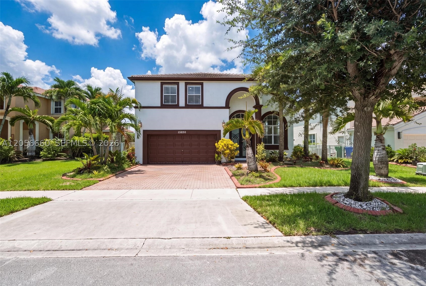 Welcome home to this inviting 4-BEDROOM, 3-BATHROOM, 2-CAR GARAGE residence in the gated community of Riviera Isles. Designed with both comfort and functionality in mind, this home features an UPDATED KITCHEN with WATERFALL QUARTZ COUNTERTOPS, SLEEK FLAT-PANEL CABINETRY, AND STAINLESS STEEL APPLIANCES that overlooks the main living areas. A FIRST-FLOOR BEDROOM AND FULL CABANA BATHROOM provide an ideal setup for guests, extended family, or a home office. Upstairs, the SPACIOUS PRIMARY SUITE offers a PRIVATE SITTING AREA, ITS OWN BALCONY, AND EXPANSIVE LAKE VIEWS, creating the perfect place to unwind. Step outside to a GENEROUSLY SIZED BACKYARD with a COVERED PATIO, MATURE MANGO TREE, TRANQUIL WATERFRONT VIEWS, AND PLENTY OF ROOM TO ADD A POOL. Residents enjoy access to EXCEPTIONAL COMMUNITY AMENITIES, including a clubhouse, fitness center, resort-style pool, basketball court, pickleball court, and more, all while being CONVENIENTLY LOCATED near shopping, dining, and major roadways.