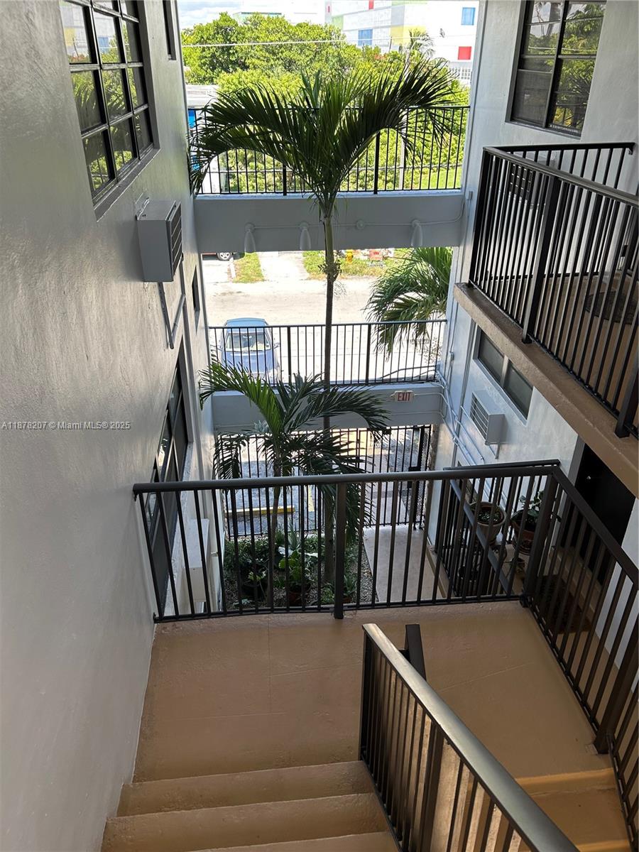 TUDOR HOUSE CONDO - Residential