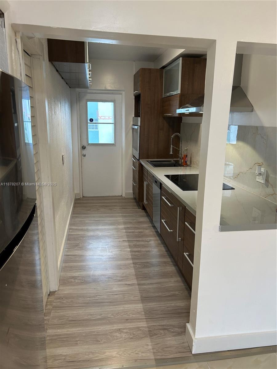 TUDOR HOUSE CONDO - Residential