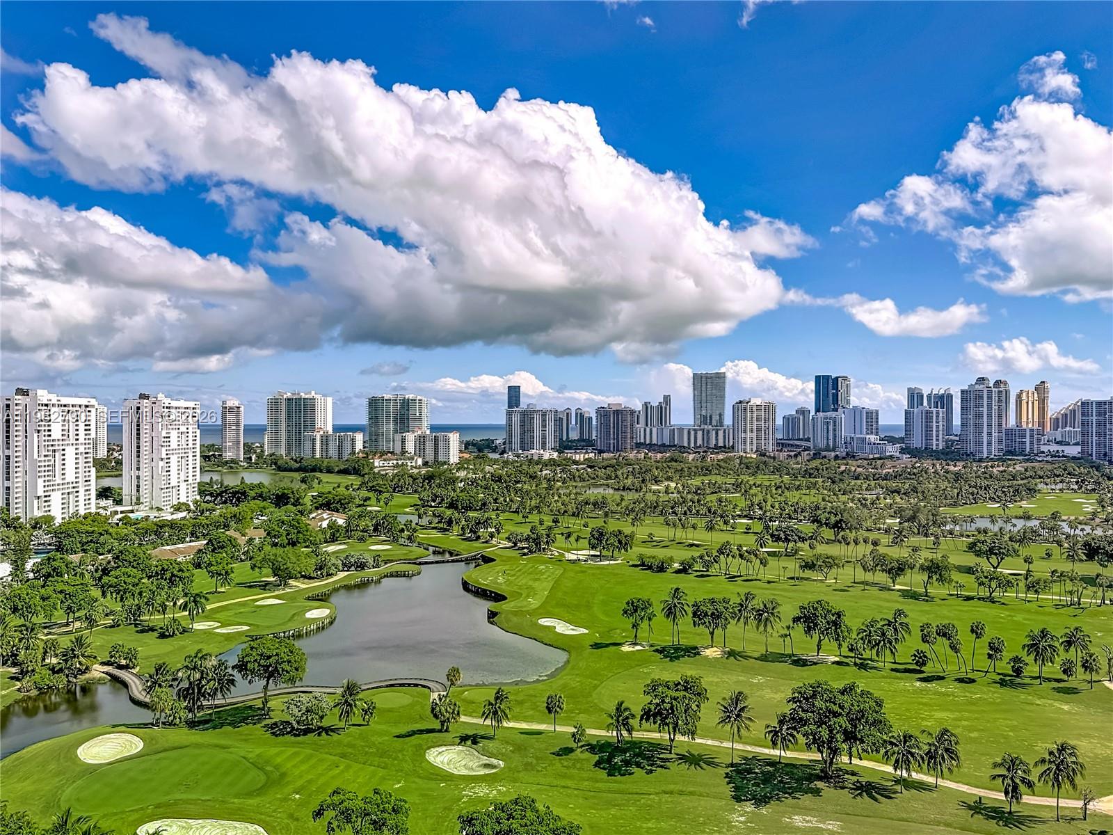 Enjoy unobstructed panoramic views of the Turnberry golf course and the ocean from this high-floor residence in Coronado Tower II. Spacious layout with floor-to-ceiling windows and a screened balcony, perfect for watching the sunrise. Updated kitchen with stainless steel appliances and ceramic flooring. The building has completed its 40-year certification and offers a gym, sauna, pool, and 24-hour security. The HOA fee includes cable, internet, water, and more. Conveniently located near Aventura Mall, beaches, and restaurants.