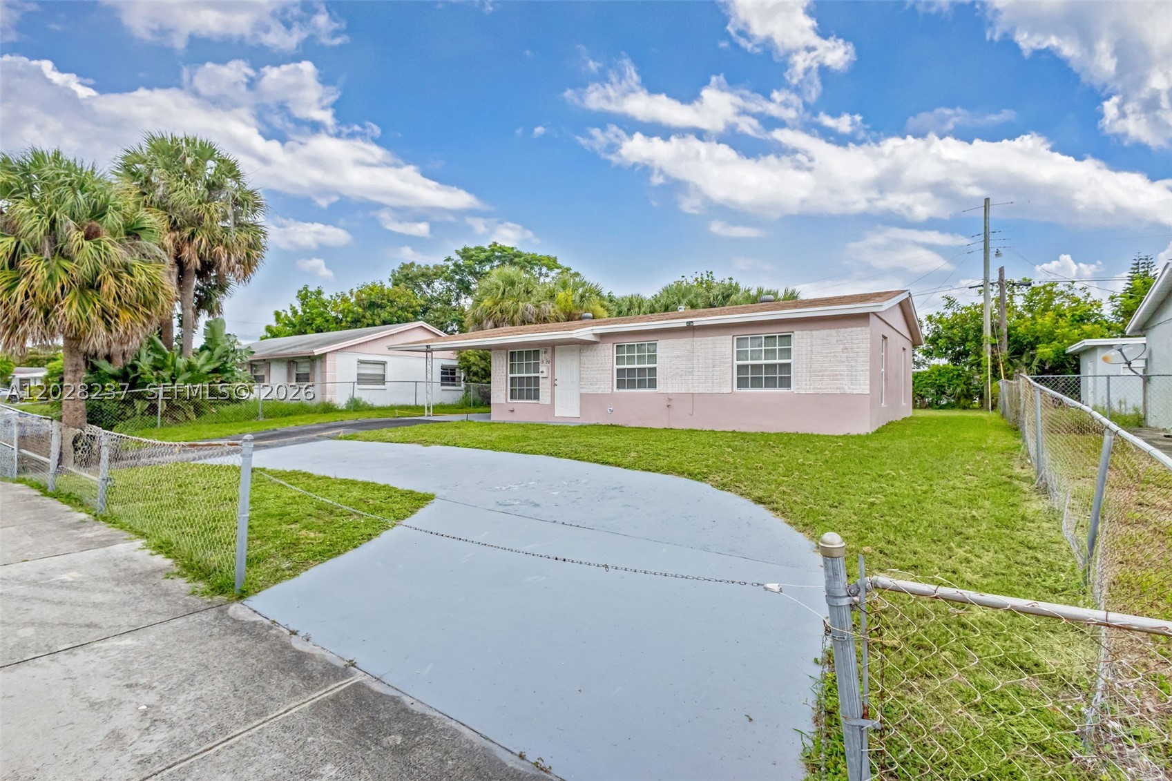 Take Advantage Of This Beautiful 3-bedroom / 2 Bath Fully Renovated Contemporary Style Home - With A Total 1504 Sq. Ft. - Nestled In Riviera Beach with in the highly Regarded Palm Beach County School District - This Homes Is In Walking Distance Of an A rated School- Features Includes: Stainless Steel Appliances - Luxury Vinyl Plank 
Flooring Through Out The Home - 1 Year Central A/C - Fairly New Maytag Washer And Dryer - Impact Windows & Doors - Covered Carport - Circular Driveway -  Spacious Back Yard Perfect For Entertaining - Conveniently To Schools - Shopping - Beaches / Single Island And I-95.  This Home Delivers Excellent Value.