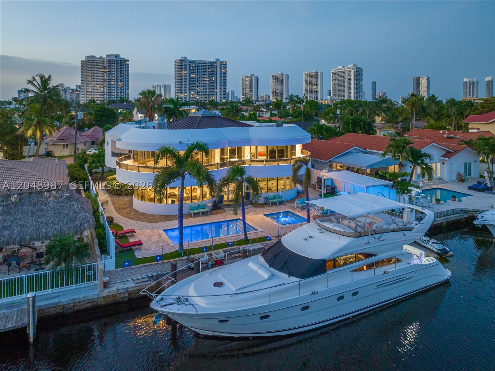 Negotiable...Gated Eastern Shores, N Miami Beach, a bike ride from Sunny Isles Beach. 6 bedroom 6.5 bath. Trophy Home for SALE and For LEASE. 80 ft waterfront. Smart Entertainment System with Robust Audio and Lighting Package.   Available for 6 or 12 month lease.  Call now!