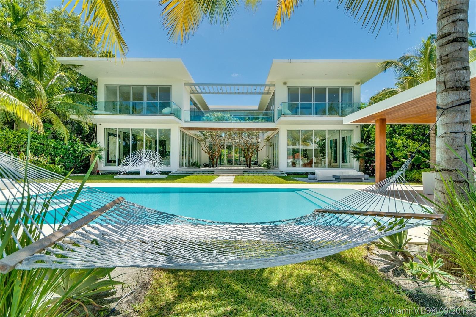 Imagine an idyllic sanctuary nestled on a private island enclave on Miami Beach, Florida, where fine living, serenity and nature meet.  1435 West 27th Street on Sunset Island II is the perfect place to call home; a haven of pure beauty, exceptional architecture and design and tranquil water views. Whether walking through the Koi filled Zen Garden, entertaining in the lushly landscaped back yard with summer kitchen, basking in heated salt water pool or relaxing on your boat, 1435 W 27th St. is a haven of pure beauty waiting for you.