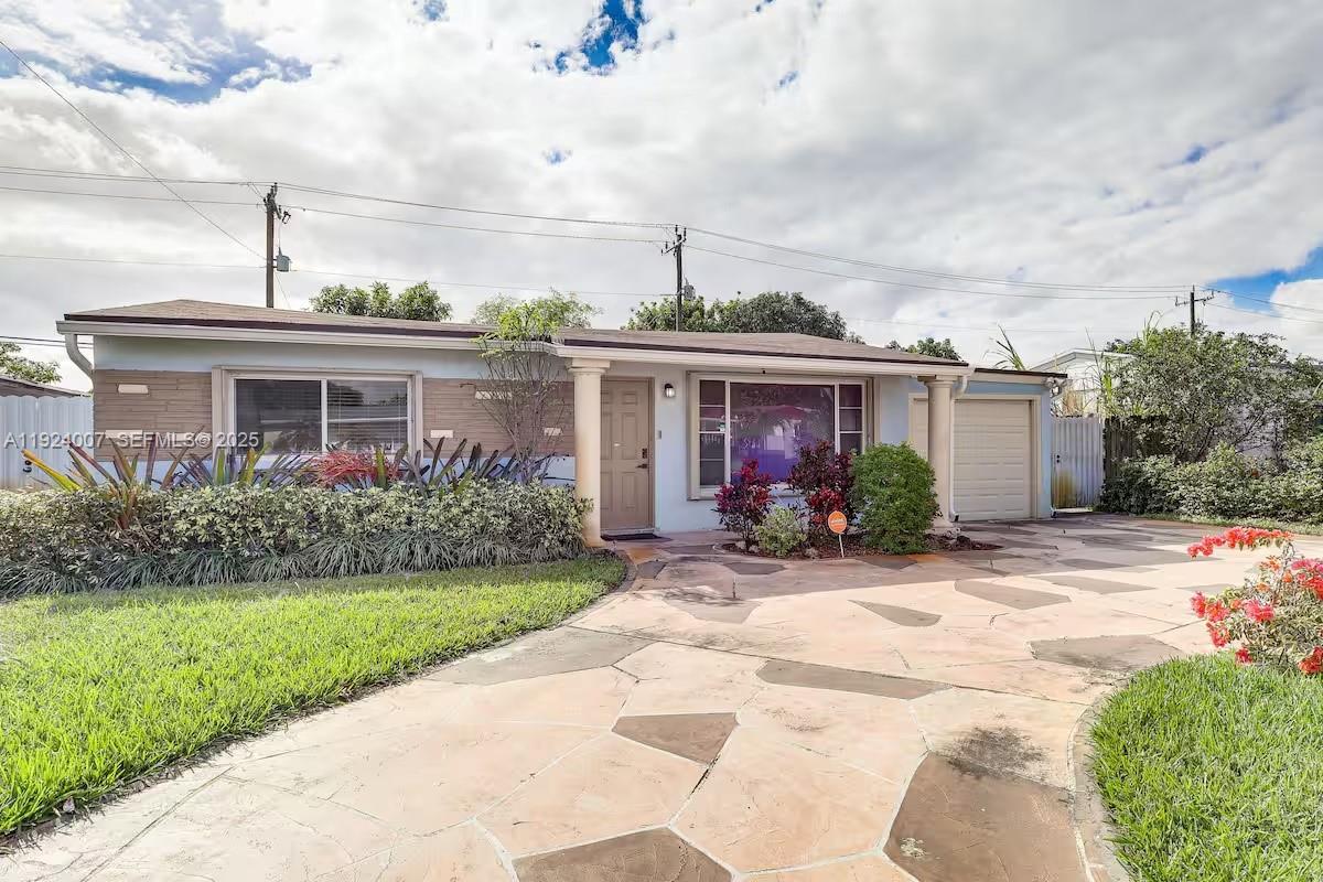 Don't miss out on this updated, spacious home in a prime Miramar location! Perfectly situated near the Florida Turnpike and Miramar’s Downtown City and Cultural Center, this beautifully updated 3-bedroom, 2-bath residence offers the ideal blend of comfort and convenience. The move-in-ready interior features a modern open layout with brand-new finishes throughout, including a stylish kitchen and upgraded bathrooms—perfect for first-time buyers or investors seeking strong rental potential. Outside, the spacious backyard provides ample room for gatherings, pets, or future expansion.