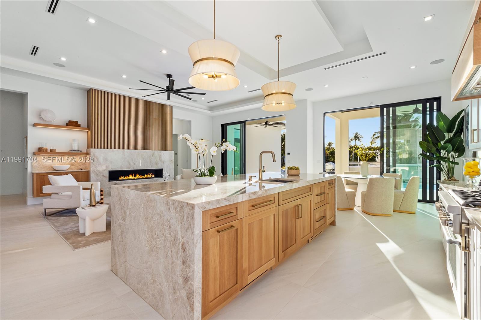 Brand new waterfront construction in the heart of Palm Beach Gardens offering the perfect blend of luxury and functionality. Designed with a thoughtful, open layout, this residence features 5 en-suite bedrooms, a private office, loft, elevator, and dual laundry rooms for ultimate convenience. Enjoy true boating lifestyle with no fixed bridges, dockage for up to a 60' yacht, and quick access to the Palm Beach Inlet. Quality craftsmanship shines through with premium finishes throughout. A collector-ready 3-car garage with lift capability accommodates up to 6 vehicles. Rare county-only property taxes! Just minutes from world-class dining, golf, shopping, and beaches; this is South Florida waterfront living at its finest.