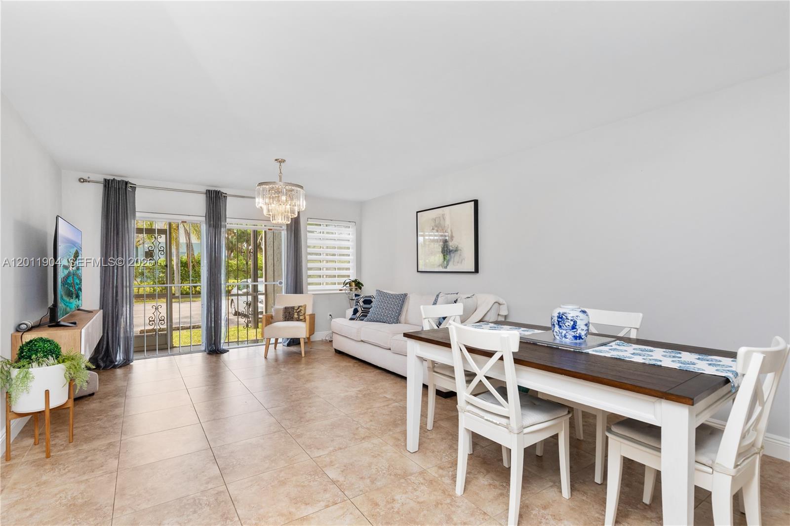 Beautifully updated condo located in the highly sought-after, gated community of The Cove in the heart of Cutler Bay. This spacious first-floor unit offers 1 bedroom and 1.5 bathrooms, featuring a modernized kitchen with sleek stainless steel appliances. The open-concept layout seamlessly connects the living and dining areas, leading to a private screened-in patio—perfect for relaxing while enjoying tranquil garden and lake views. Enjoy peace of mind with low condo fees that include insurance, building maintenance (including roof repairs), amenities, and security. The association maintains reserves, and there are no special assessments. FNMA approved Condo-can buy with 3-5% down payment. Ideally situated just moments from shopping, dining, entertainment, and top-rated neighborhood schools, with easy access to Old Cutler Road and the Turnpike. An excellent opportunity for first-time buyers, empty nesters, or investors. Schedule your private showing today!