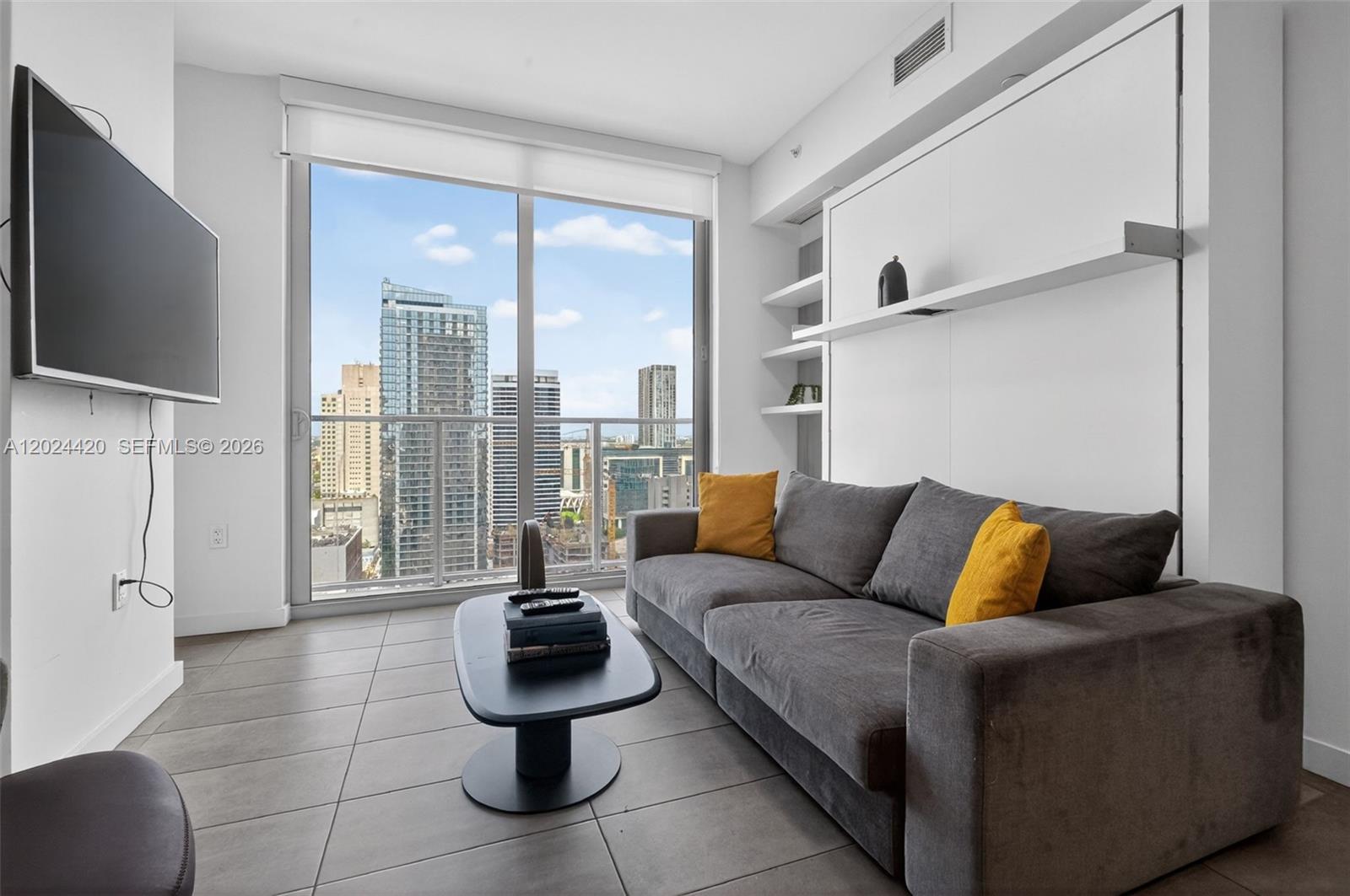 Experience the best of both worlds with this fully furnished, spacious 1-bedroom, 1-bathroom unit at YOTELPAD Miami, located in the heart of Downtown. Just steps from Bayside Marketplace, Kaseya Center, PortMiami, Brickell, Metromover, top restaurants, and entertainment, this residence offers a functional layout, its fully equipped, has a washer and dryer in-unit, balcony, and contemporary furnishings designed for comfort and style. Enjoy resort style amenities such as a state-of-the-art gym, pool, on-site bar and restaurants, 24/7 front desk service, and more. Ideal for personal use or investment, this property provides unmatched flexibility with no rental restrictions. it’s move-in ready! Whether for your own enjoyment or as a lucrative income-generating investment, this property is a perfect fit.