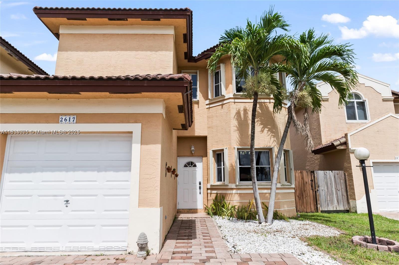 Beautiful 3-bedroom, 2.5-bath single family home with 1-car garage in the gated Waterstone community. This two-story home features French doors, screened patio with lakeview, laminate flooring throughout, and a real wood staircase. The kitchen is updated with stainless steel appliances, modern fixtures, backsplash, and custom shelving. New AC installed in 2021. The primary bedroom offers a lake view and large walk-in closet. Enjoy resort-style amenities including a clubhouse, gym, 2 pools, kiddie pool, and park. Low HOA and move-in ready. Conveniently located near US-1, the Turnpike, Publix, Walmart, Starbucks, schools, and just minutes from Homestead Air Force Base. Florida living at its best!
