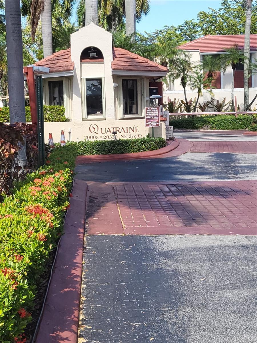 Looking for space, security, and a view? Don't miss this rare opportunity to own a meticulously maintained three bedroom, two bath condo, in a serene guard gated community. This split floor plan unit is in excellent condition, with partial lake views, a brand new AC system, and all the appliances are under 6 years old. The interior shines with large format neutral tiles and fresh paint complemented by modern recessed lighting. The standout feature is the oversized screened balcony providing an ideal space for a children's play area, an outdoor lounge, or a morning yoga retreat. Unit is located just west of Aventura with world class shopping and gourmet dining. **All of this unmatched proximity to the city's vibrant conveniences, while enjoying a peaceful private escape**You'll also have fast access to the airports, I-95, and the new Brightline station, putting the best of Florida at your doorstep. This move-in gem will not last!!! schedule your private tour today. ****Owner is paying 6 months of your maintenance and all assessments in full!!!! with full price offer*****