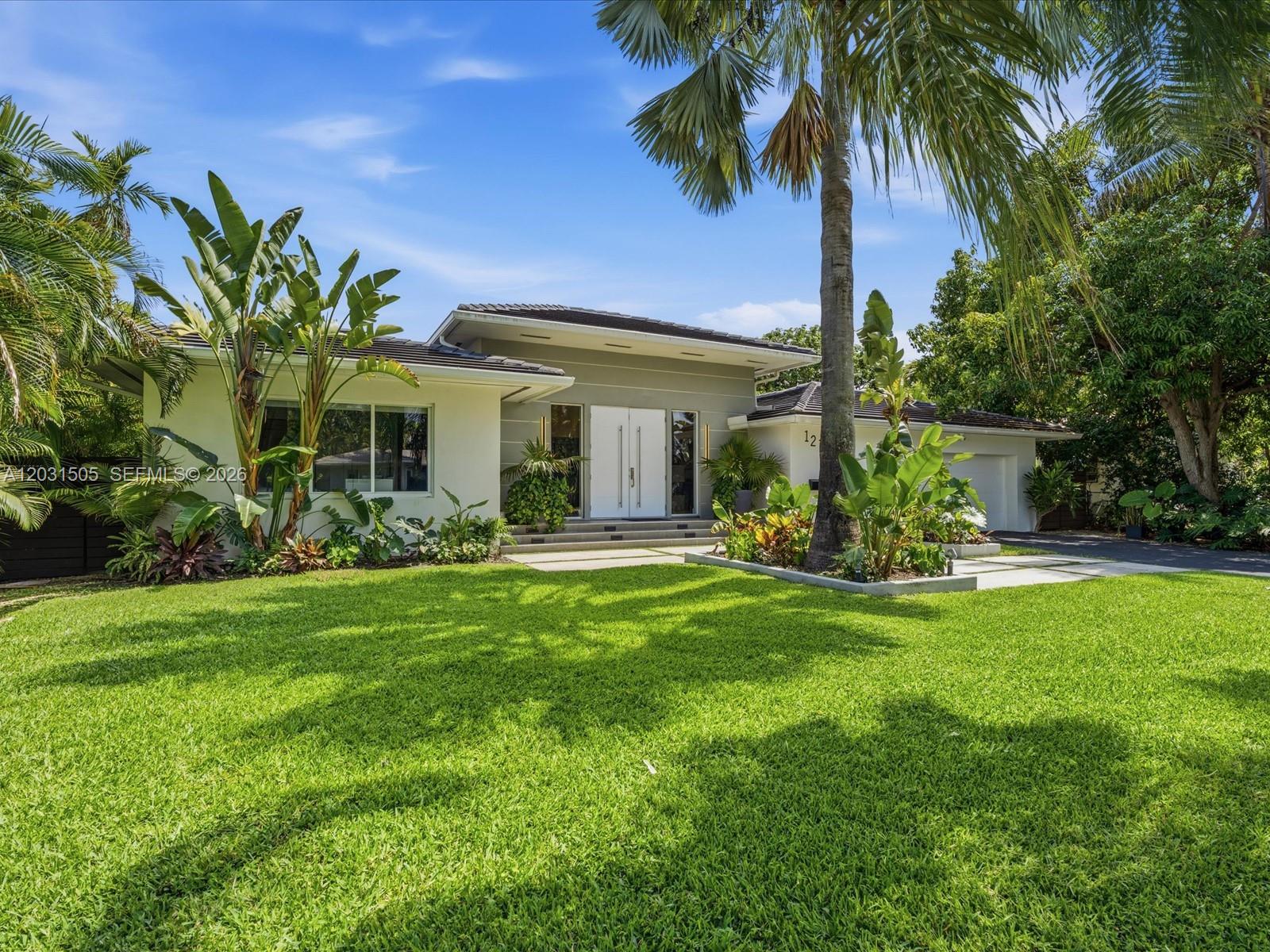 Welcome home to this beautifully remodeled Miami Shores retreat just steps from Biscayne Bay.
This stunning 3-bedroom, 2.5-bathroom plus an office home has been completely renovated with smart home technology from top to bottom, blending modern finishes with timeless South Florida charm. Step inside to find an open, light-filled layout, designer touches throughout, and a seamless flow from indoor living to your own private  outdoor oasis.
The backyard is a true highlight: a sparkling private salt water pool surrounded by lush landscaping that delivers complete privacy — your personal escape to relax, entertain, and enjoy the Florida lifestyle year-round.
Located just a couple of houses from the bay, this home offers privacy and quite living, tree-lined character that makes Miami Shores one of South Florida's most sought-after communities. You're minutes from top dining, the village's boutique shops, parks, golf, and an easy commute to Downtown Miami and the beaches.
Move-in ready and meticulously updated. Schedule your private showing today.
