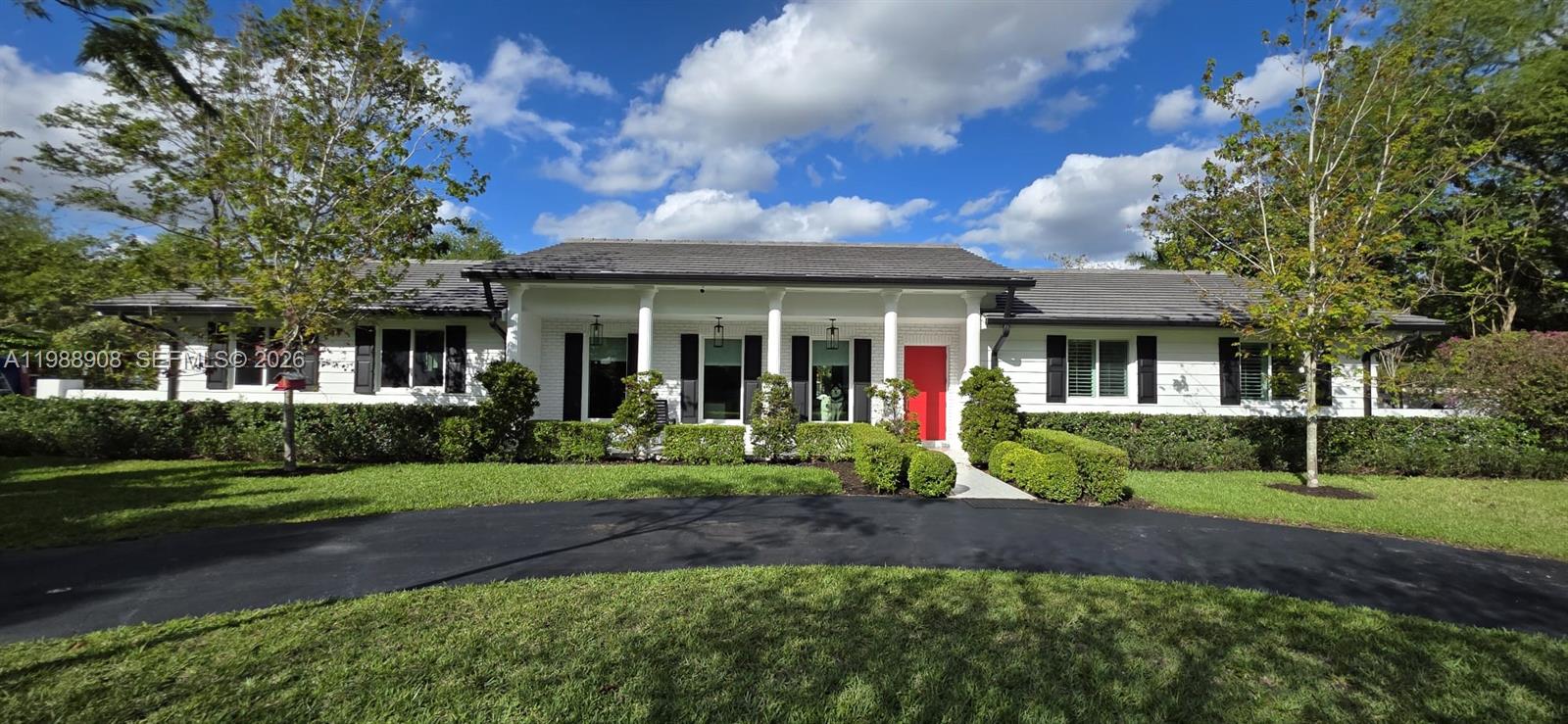 Welcome to Thousand Pines, a private, walled community in the heart of Miami offering tranquility and convenience. This well-maintained neighborhood features 24hr camera monitoring, lighted tennis and pickleball courts, and is located in a no flood zone—providing both security and peace of mind. Surrounded by lush landscaping and beautiful live oaks, residents enjoy a serene setting just minutes from major thoroughfares, shopping, dining, and entertainment. This fully updated 4-bedroom, 2-bathroom pool home offers 3,810 total sq ft, 3,003 adj sq ft, and 2,433 sq ft of living area, situated on an oversized 28,925 sq ft lot with ample room for expansion or the addition of a guest or pool house. Renovated by its architect owner, the home features impact windows, doors, and garage door, a 22KW full-house generator with automatic transfer switch, a 7-year-old cement tile roof, and fresh interior and exterior paint. The custom 12’ x 25’ Porcelanosa kitchen showcases Krion countertops with full-height backsplash and a premium stainless steel KitchenAid Pro appliance package, including gas cooktop, double ovens, two dishwashers, built-in beverage center, 48” cabinet-depth refrigerator/freezer, 600 CFM exhaust vented through the roof. Additional features include a new 5-ton A/C system with smart thermostat and individually return-ducted rooms for enhanced efficiency and comfort. Spacious backyard with pool offers ideal space for entertaining family and friends. Will not disappoint!