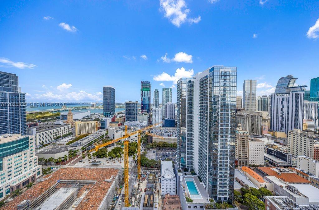 District 225 Residences is a 37-story luxury residential tower in the heart of Downtown Miami. Units are delivered fully furnished short-term rentals (Airbnb), annual leasing, or personal use. Designed as a resort-style, full-service building, this property is ideal for both investors and end users. Amenities include  pool deck, social lounge, indoor and outdoor bars, entertainment room, and two full floors of premium facilities. Enjoy a state-of-the-art fitness center, indoor rock-climbing wall, basketball court, racquetball court 24/7 security and concierge. A prime opportunity in one of Miami’s most dynamic and high-demand locations.