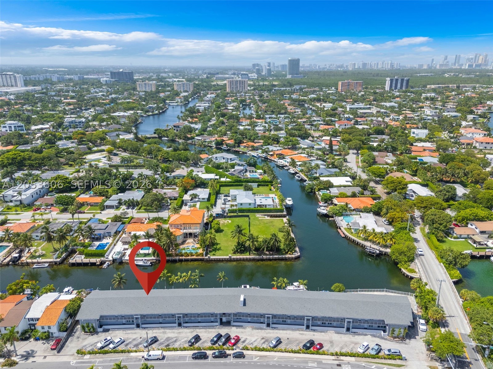 Discover the pinnacle of coastal living in this modern canalfront sanctuary. Designed for ultimate privacy, this residence offers unobstructed, panoramic water views, where manatees and dolphins regularly frequent the waters just off your balcony. Just minutes from the prestigious Bal Harbour Shops, this tranquil retreat seamlessly combines immediate access to a vibrant maritime lifestyle, world-class dining, and boating.